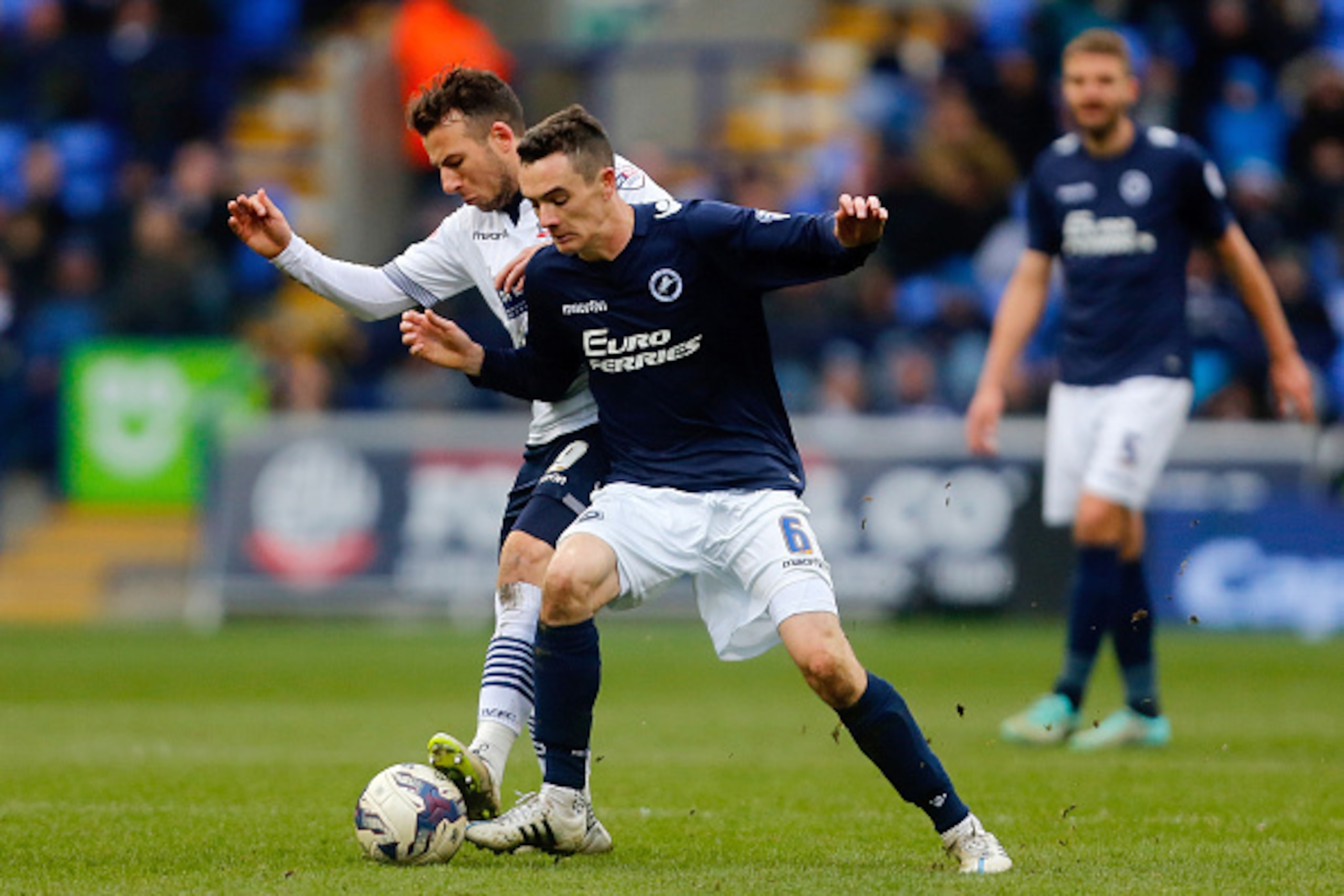 BOLTON, ENGLAND - MARCH 14: Adam Le Fondre (L) of Bolton in action with Shaun Williams of Millwall during the Sky Bet Championship match between Bolton Wanderers and Millwall at the Macron Stadium on March 14, 2015 in Bolton, England. (Photo by Paul Thoma BOLTON, ENGLAND - MARCH 14: Adam Le Fondre (L) of Bolton in action with Shaun Williams of Millwall during the Sky Bet Championship match between Bolton Wanderers and Millwall at the Macron Stadium on March 14, 2015 in Bolton, England. (Photo by Paul Thoma