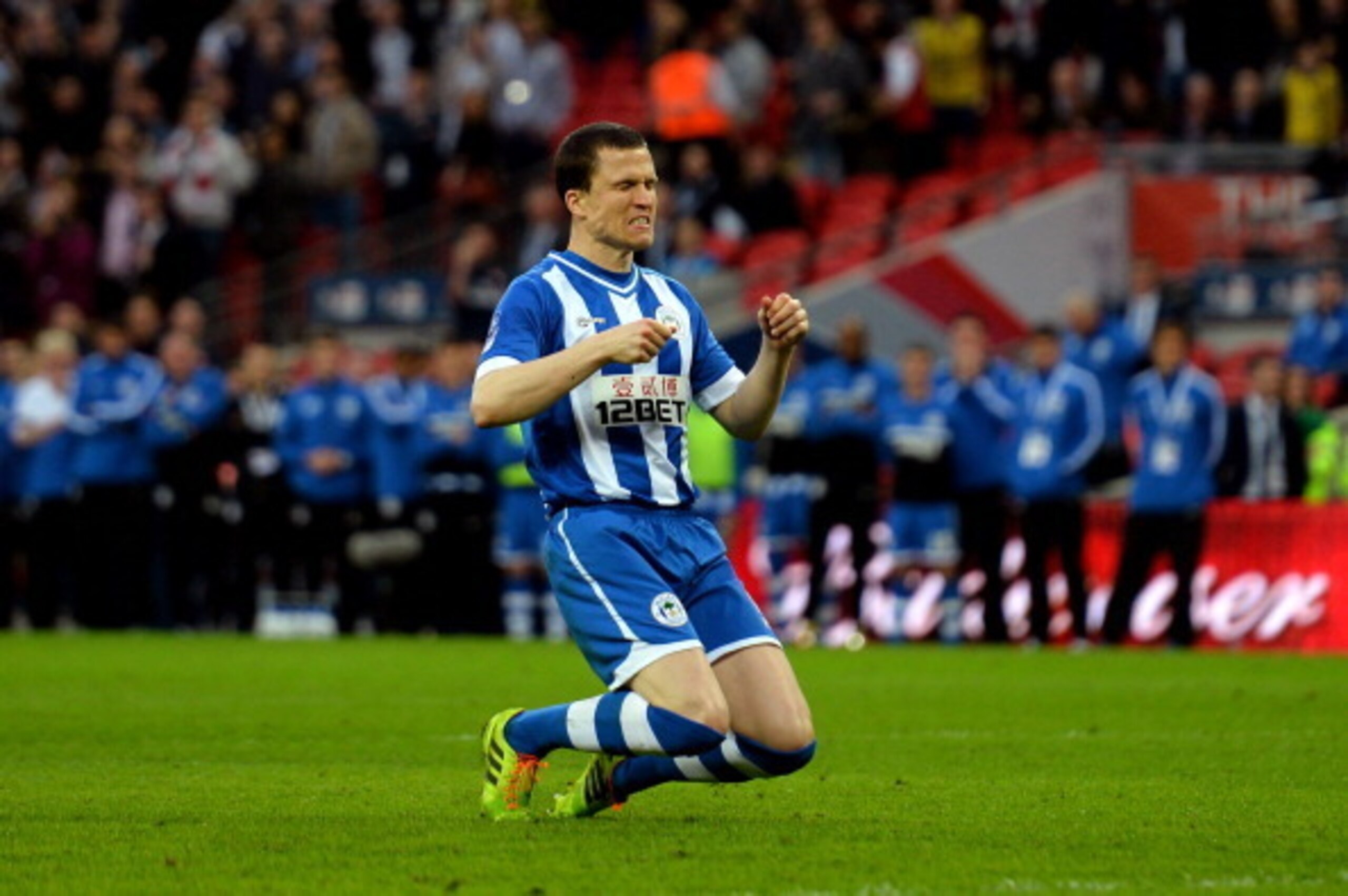 LONDON, ENGLAND - APRIL 12: Gary Caldwell of Wigan Athletic reacts after missing a penalty in the shoot out during the FA Cup Semi-Final match between Wigan Athletic and Arsenal at Wembley Stadium on April 12, 2014 in London, England. (Photo by Shaun Bo LONDON, ENGLAND - APRIL 12: Gary Caldwell of Wigan Athletic reacts after missing a penalty in the shoot out during the FA Cup Semi-Final match between Wigan Athletic and Arsenal at Wembley Stadium on April 12, 2014 in London, England. (Photo by Shaun Bo