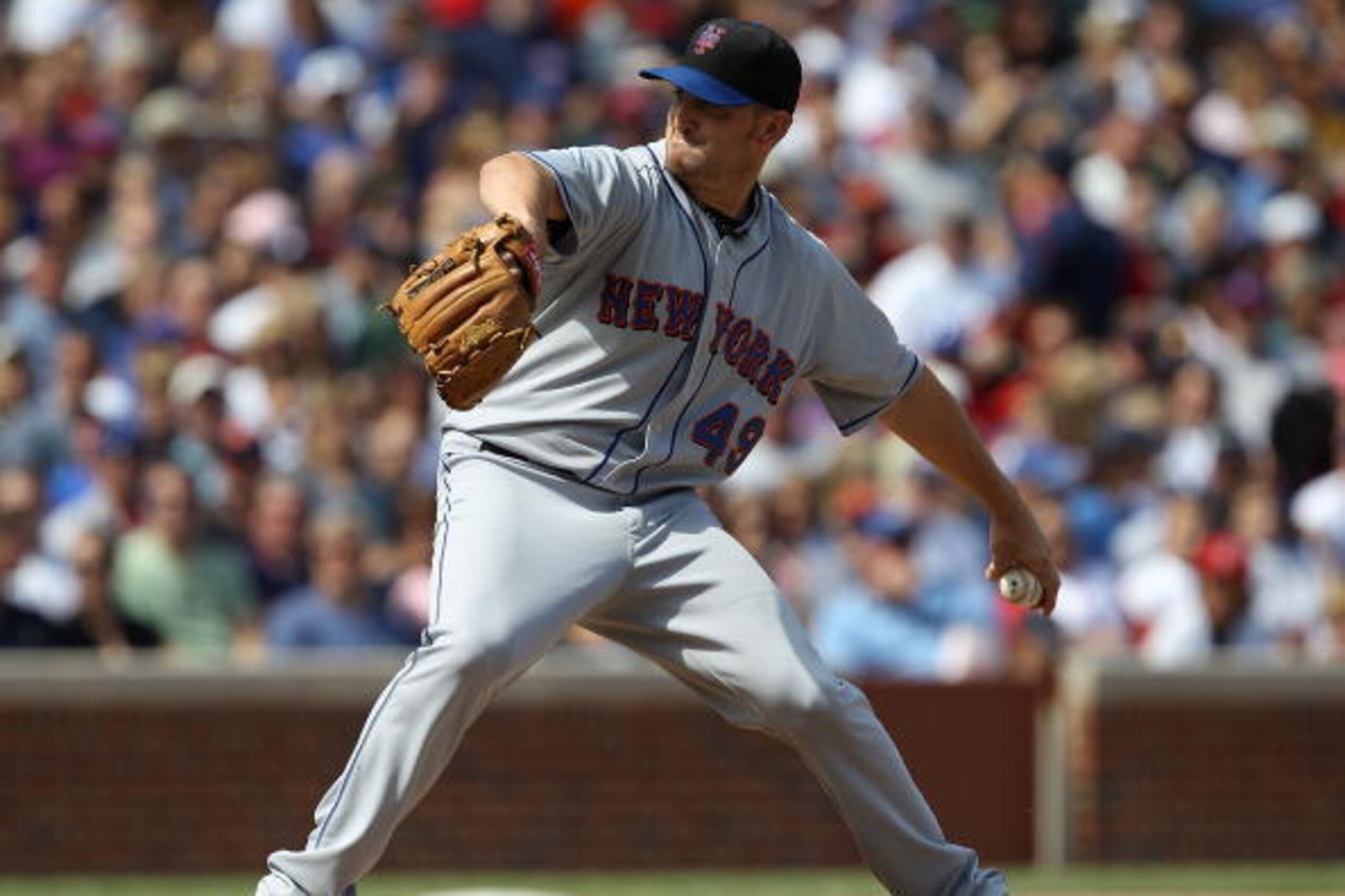 CHICAGO - SEPTEMBER 05: Starting pitcher Jonathan Niese #49 of the New York Mets delivers the ball against the Chicago Cubs at Wrigley Field on September 5, 2010 in Chicago, Illinois. The Mets defeated the Cubs 18-5. (Photo by Jonathan Daniel/Getty Images CHICAGO - SEPTEMBER 05: Starting pitcher Jonathan Niese #49 of the New York Mets delivers the ball against the Chicago Cubs at Wrigley Field on September 5, 2010 in Chicago, Illinois. The Mets defeated the Cubs 18-5. (Photo by Jonathan Daniel/Getty Images