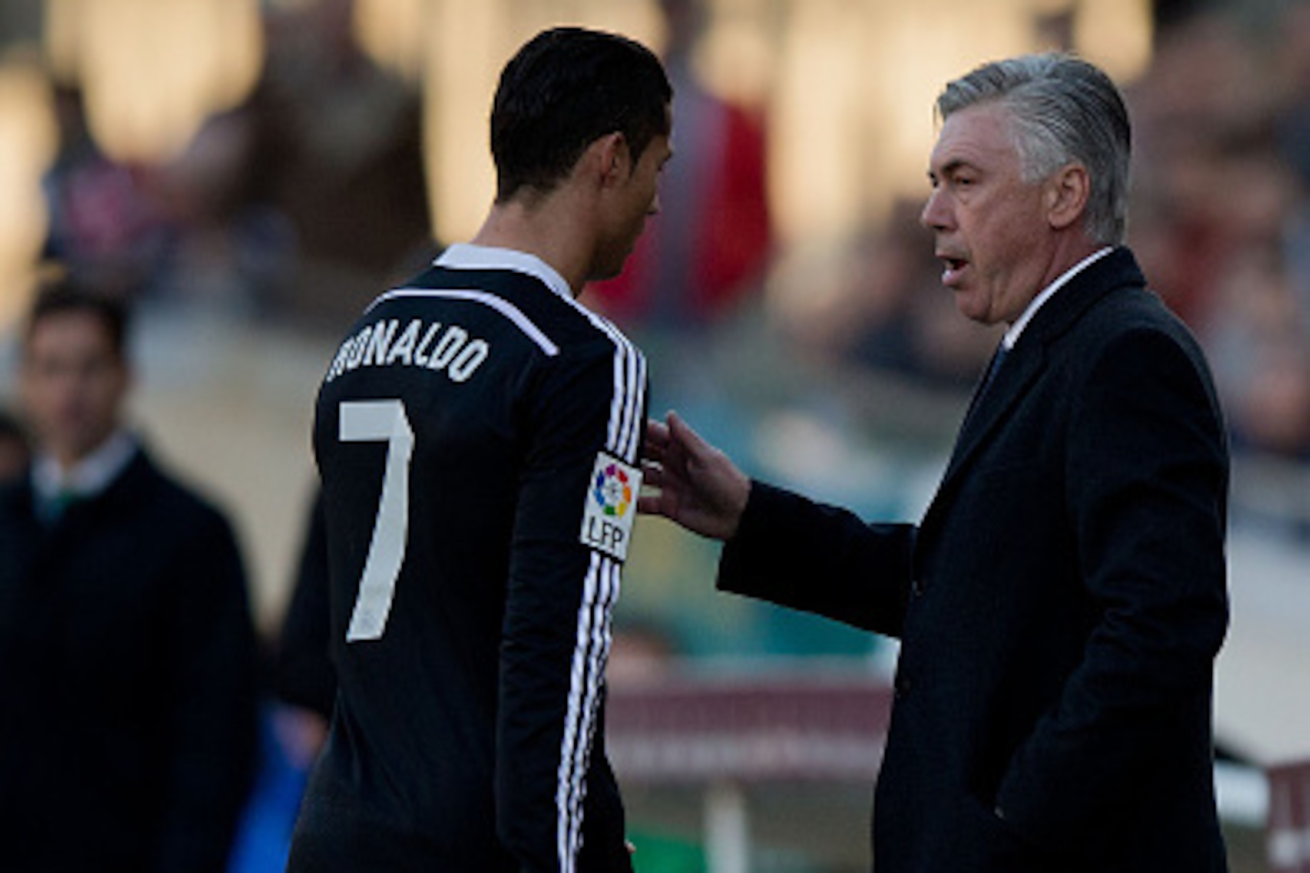 CORDOBA, SPAIN - JANUARY 24: Head coach Carlo Ancelotti (R) of Real Madrid CF speaks to Cristiano Ronaldo (L) as he leaves the pitch after being reprimanded with a red card during the La Liga match between Cordoba CF and Real Madrid CF at El Arcangel stad CORDOBA, SPAIN - JANUARY 24: Head coach Carlo Ancelotti (R) of Real Madrid CF speaks to Cristiano Ronaldo (L) as he leaves the pitch after being reprimanded with a red card during the La Liga match between Cordoba CF and Real Madrid CF at El Arcangel stad