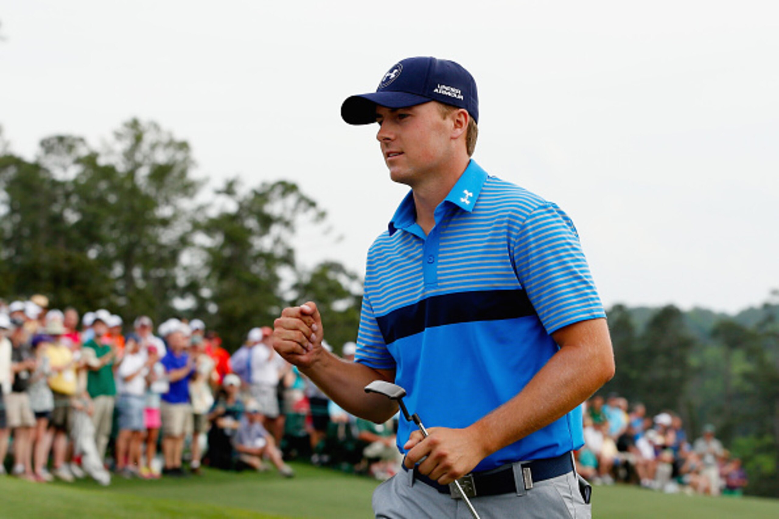 AUGUSTA, GA - APRIL 09: Jordan Spieth of the United States celebrates on the 18th green after an eighth-under par 64 during the first round of the 2015 Masters Tournament at Augusta National Golf Club on April 9, 2015 in Augusta, Georgia. (Photo by Ezra AUGUSTA, GA - APRIL 09: Jordan Spieth of the United States celebrates on the 18th green after an eighth-under par 64 during the first round of the 2015 Masters Tournament at Augusta National Golf Club on April 9, 2015 in Augusta, Georgia. (Photo by Ezra