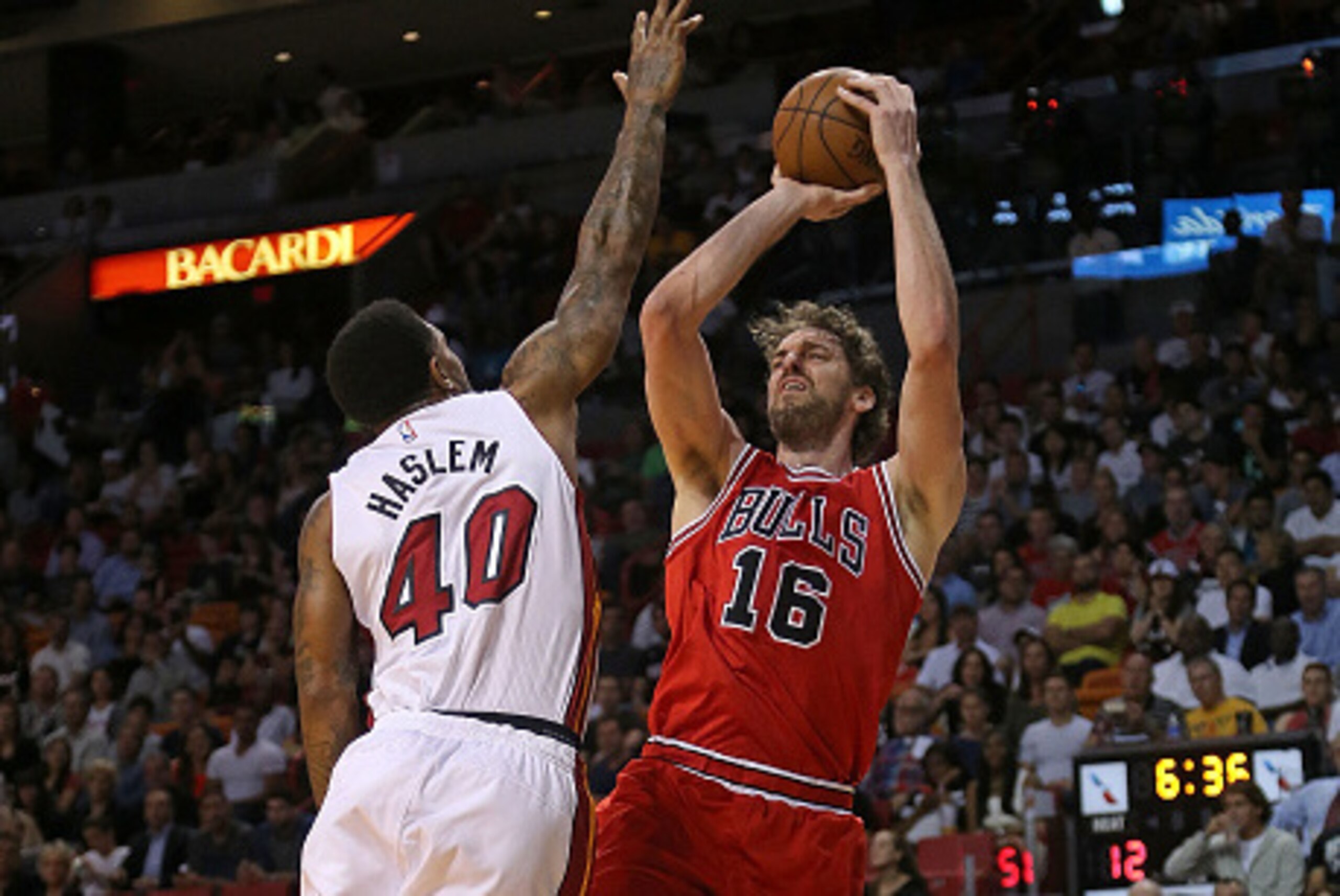 MIAMI, FL - APRIL 09:  Udonis Haslem #40 of the Miami Heat guards Pau Gasol #16 of the Chicago Bulls during a game  at American Airlines Arena on April 9, 2015 in Miami, Florida. NOTE TO USER: User expressly acknowledges and agrees that, by downloading an