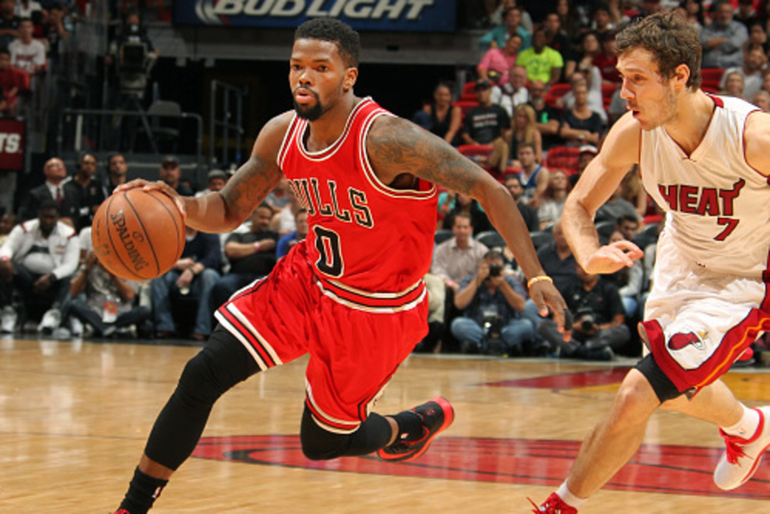 MIAMI, FL - APRIL 9: Aaron Brooks #0 of the Chicago Bulls drives to the basket against the Miami Heat during the game on April 9, 2015 at AmericanAirlines Arena in Miami, Florida. NOTE TO USER: User expressly acknowledges and agrees that, by downloading a