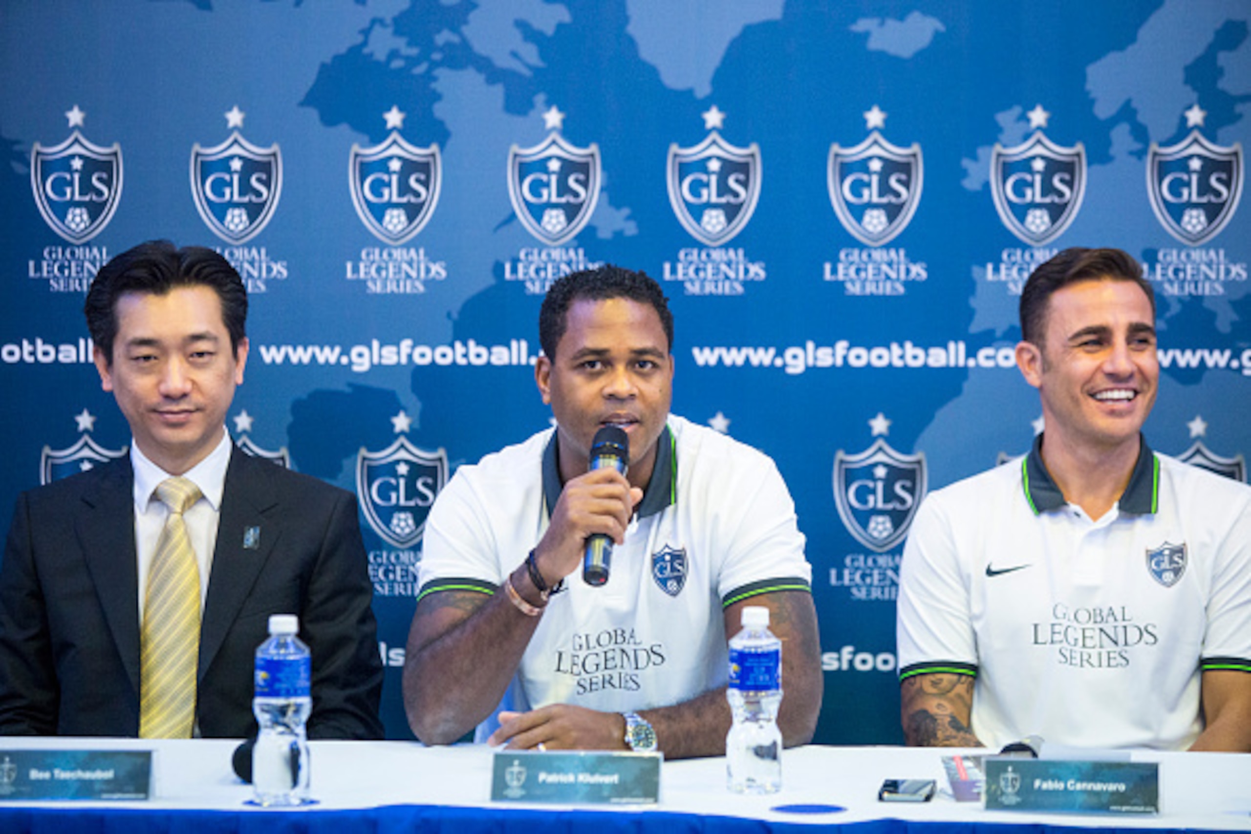 KUALA LUMPUR, MALAYSIA - OCTOBER 27: Patrick Kluivert (c) speaks as Bee Taechaubol (l), CEO of Thai Prime Co. ltd., and Fabio Cannavaro (r) look on during a Global Legends Series media event on October 27, 2014 in Kuala Lumpur, Malaysia. (Photo by Charles