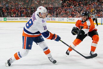 PHILADELPHIA, PA - APRIL 07: Ryan Strome #18 of the New York Islanders takes a shot towards the goal as Brandon Manning #43 of the Philadelphia Flyers defends against him on April 7, 2015 at the Wells Fargo Center in Philadelphia, Pennsylvania.  (Photo by