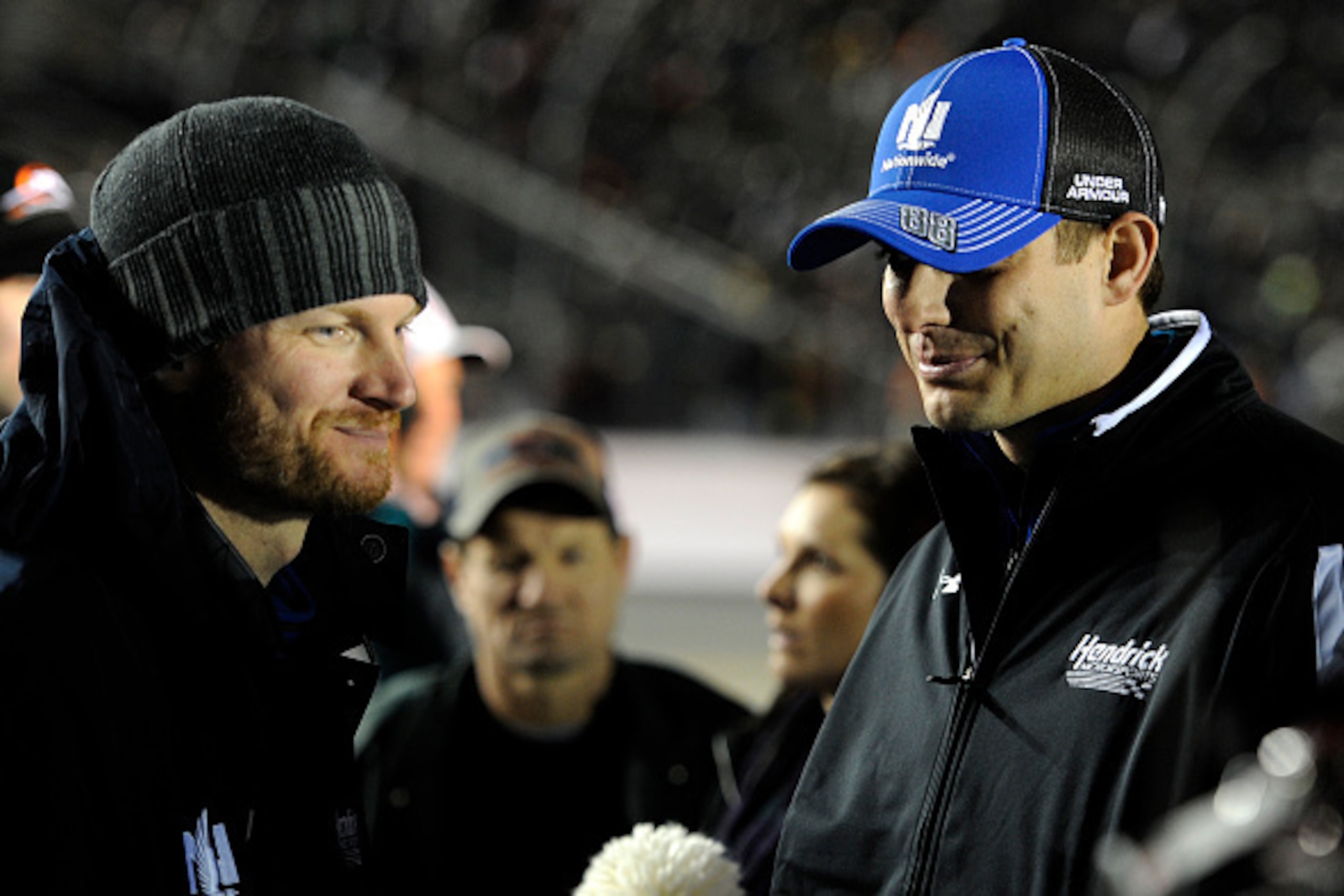 DAYTONA BEACH, FL - FEBRUARY 19:  Dale Earnhardt Jr., driver of the #88 Nationwide Chevrolet, left, and crew chief Greg Ives take part in pre-race ceremonies for the NASCAR Sprint Cup Series Budweiser Duel 1 at Daytona International Speedway on February 1