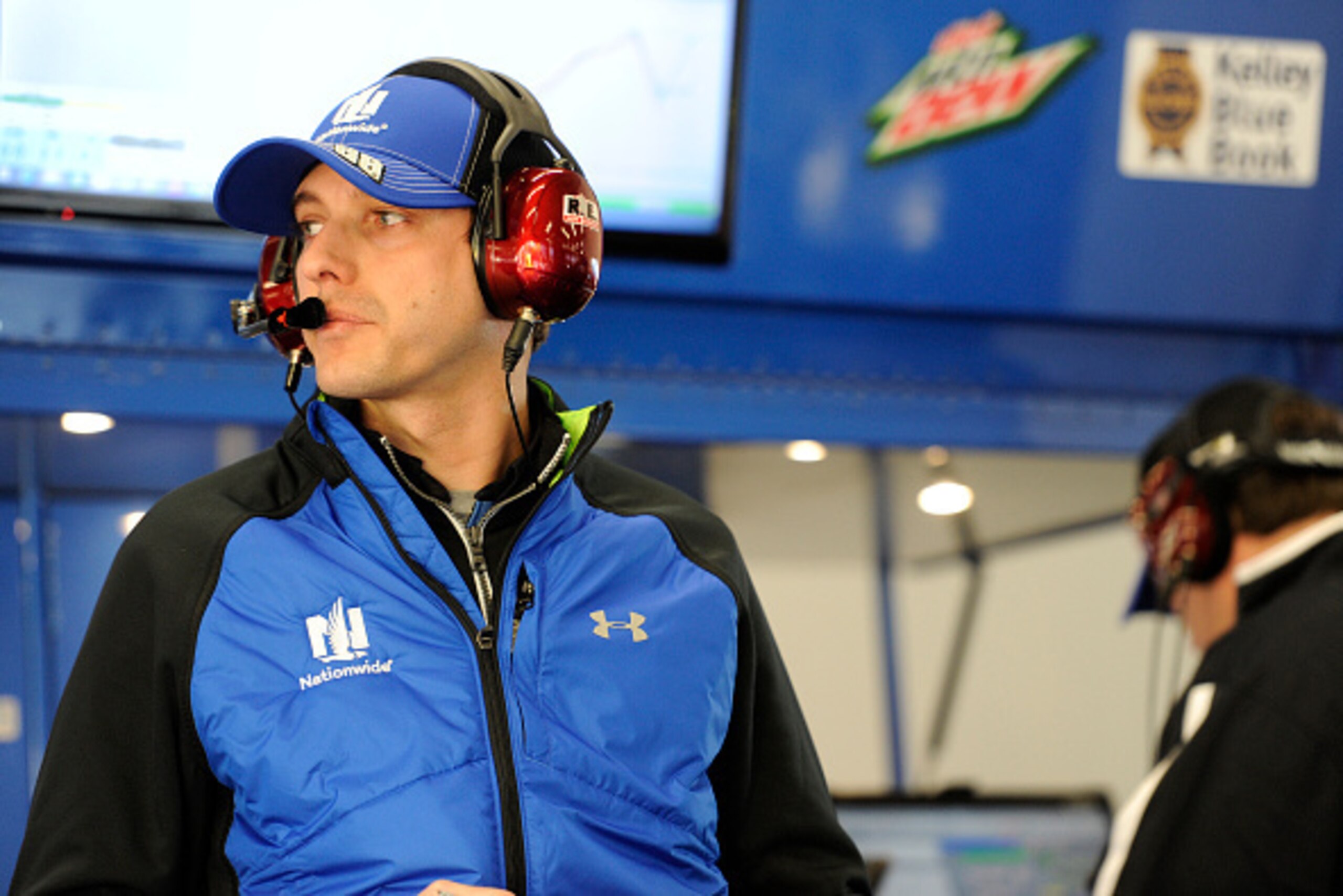 DAYTONA BEACH, FL - FEBRUARY 13: Greg Ives, crew chief for Dale Earnhardt Jr., driver of the #88 Nationwide Chevrolet, stands in the garage area during practice for the NASCAR Sprint Cup Series 3rd Annual Sprint Unlimited at Daytona International Speedway