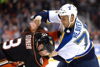 ANAHEIM, CA - JANUARY 02:  Ryan Reaves #75 of the St. Louis Blues fights Clayton Stoner #3 of the Anaheim Ducks to the ice during the first period at Honda Center on January 2, 2015 in Anaheim, California.  (Photo by Harry How/Getty Images)