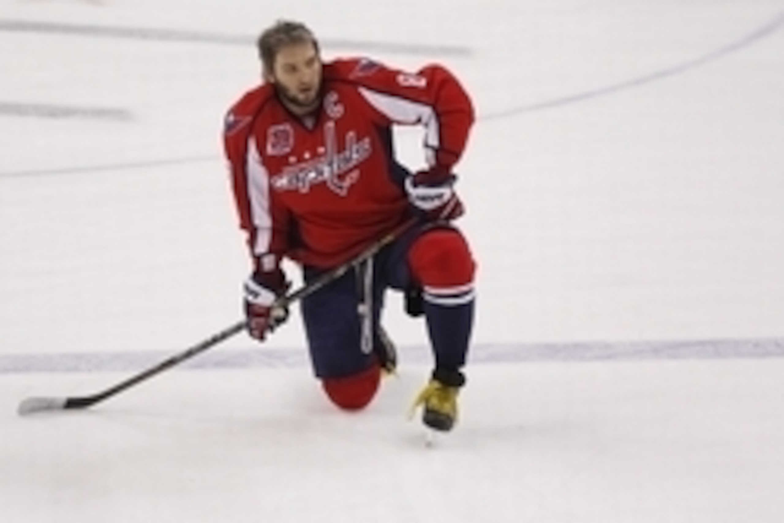 Apr 8, 2015; Washington, DC, USA; Washington Capitals left wing Alex Ovechkin (8) kneels on the ice during warm ups prior to the Capitals' game against the Boston Bruins at Verizon Center. Mandatory Credit: Geoff Burke-USA TODAY Sports Apr 8, 2015; Washington, DC, USA; Washington Capitals left wing Alex Ovechkin (8) kneels on the ice during warm ups prior to the Capitals' game against the Boston Bruins at Verizon Center. Mandatory Credit: Geoff Burke-USA TODAY Sports
