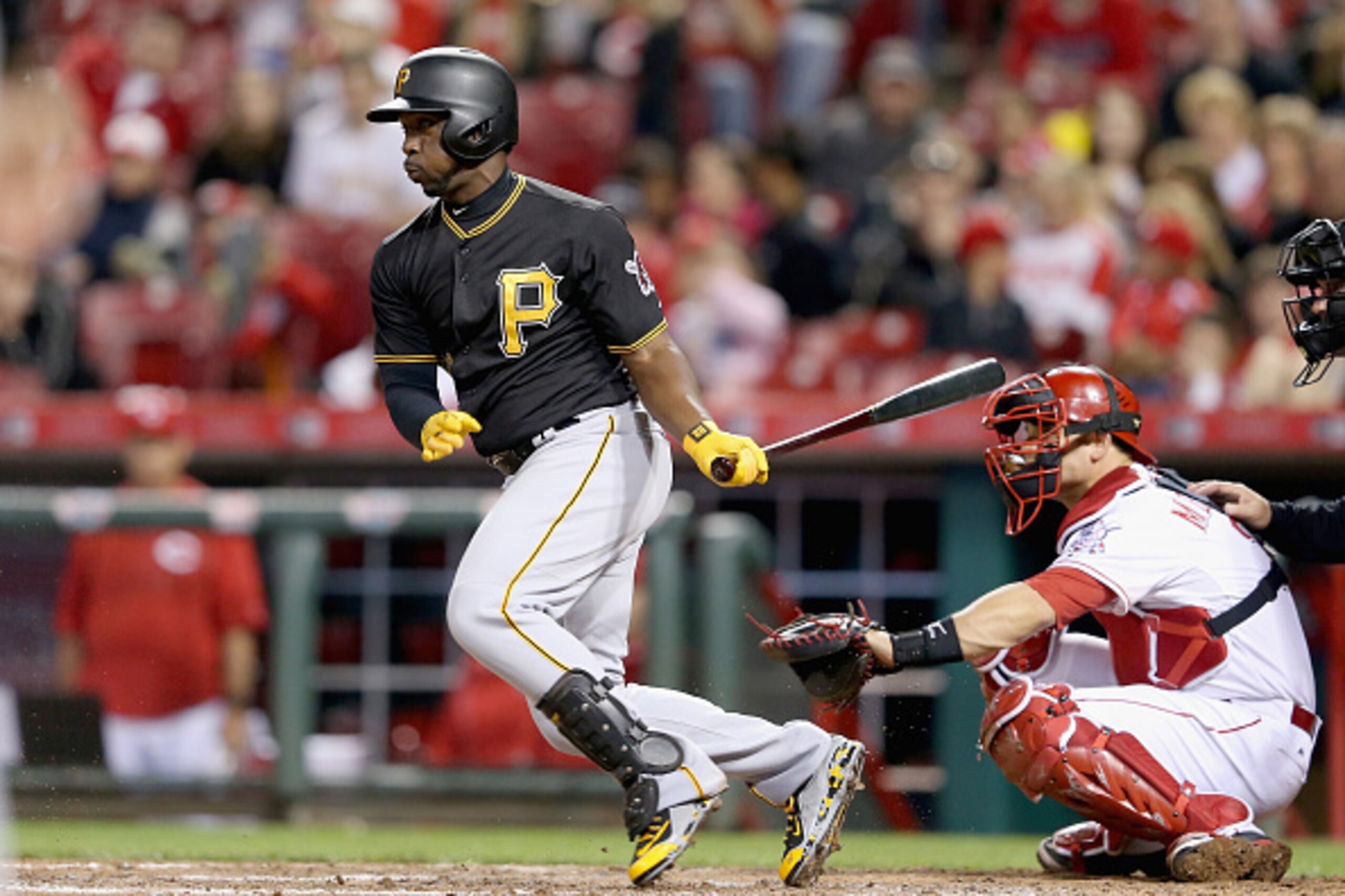 CINCINNATI, OH - APRIL 08:  Andrew McCutchen #22 of the Pittsburgh Pirates hits a sacrifice in the 5th inning against the Cincinnati Reds at Great American Ball Park on April 8, 2015 in Cincinnati, Ohio.  (Photo by Andy Lyons/Getty Images)