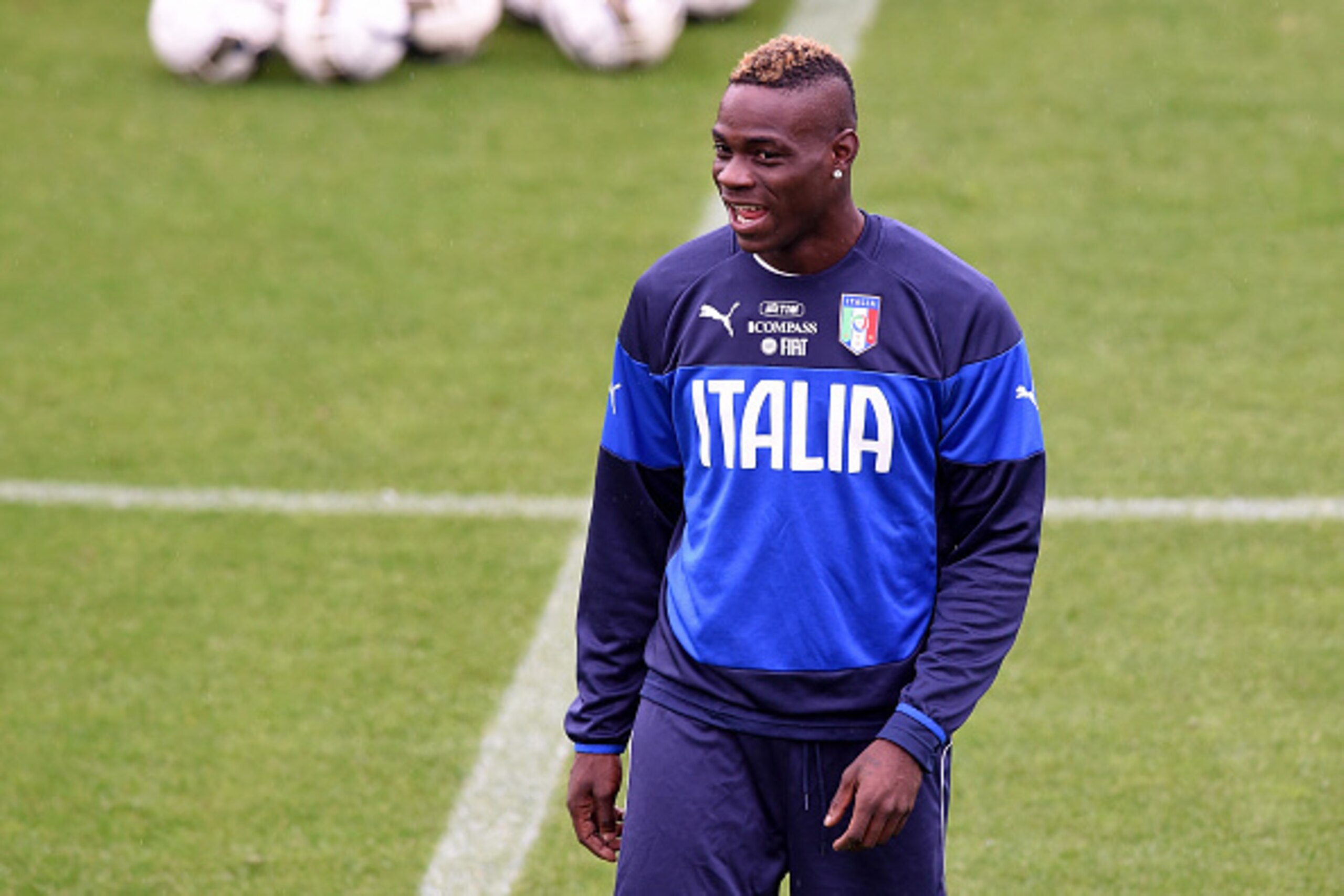 FLORENCE, ITALY - NOVEMBER 12:  Mario Balotelli during Italy Training Session at Coverciano on November 12, 2014 in Florence, Italy.  (Photo by Claudio Villa/Getty Images)