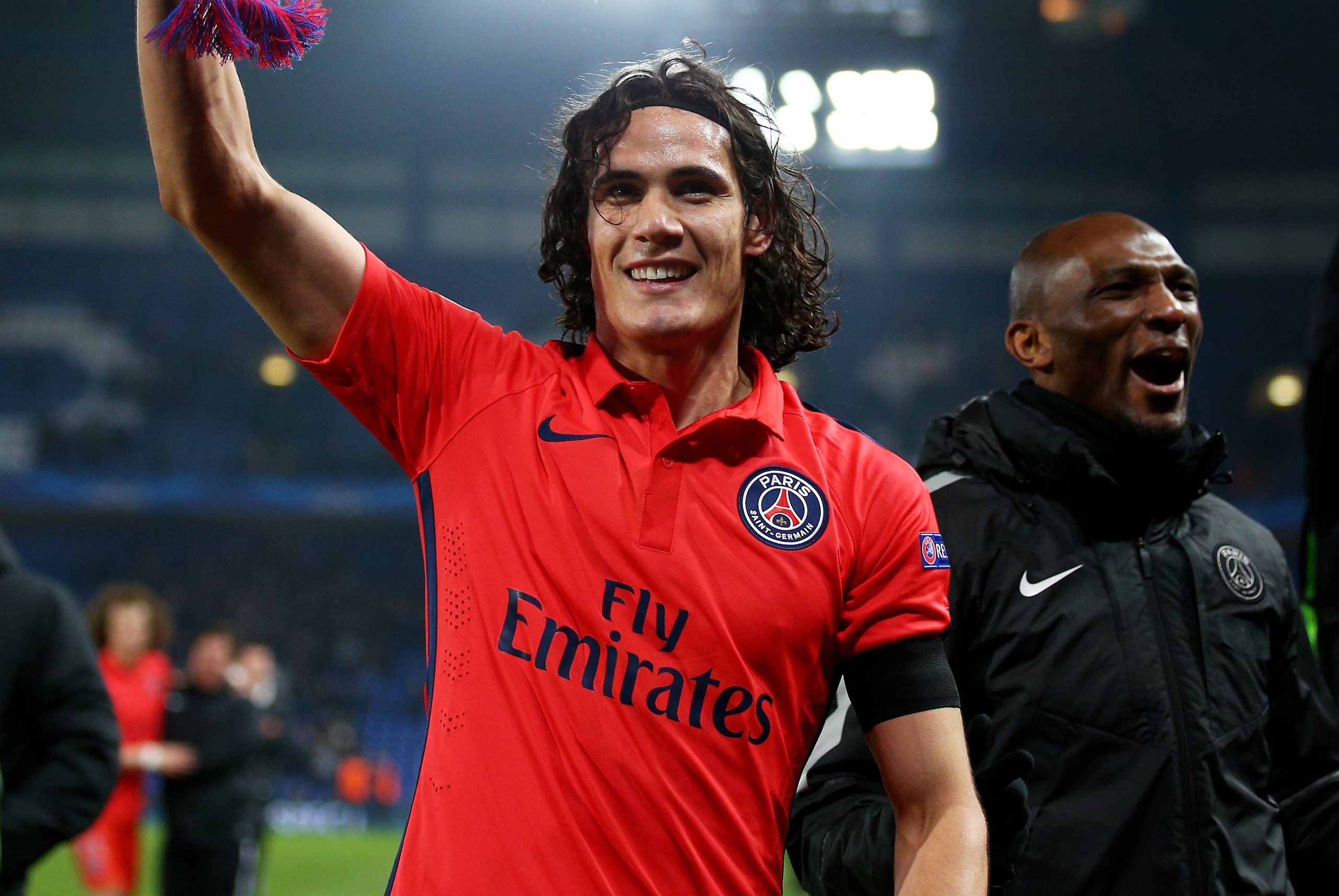 LONDON, ENGLAND - MARCH 11: Edinson Cavani of PSG celebrates following his team's victory in extra time during the UEFA Champions League Round of 16, second leg match between Chelsea and Paris Saint-Germain at Stamford Bridge on March 11, 2015 in London,
