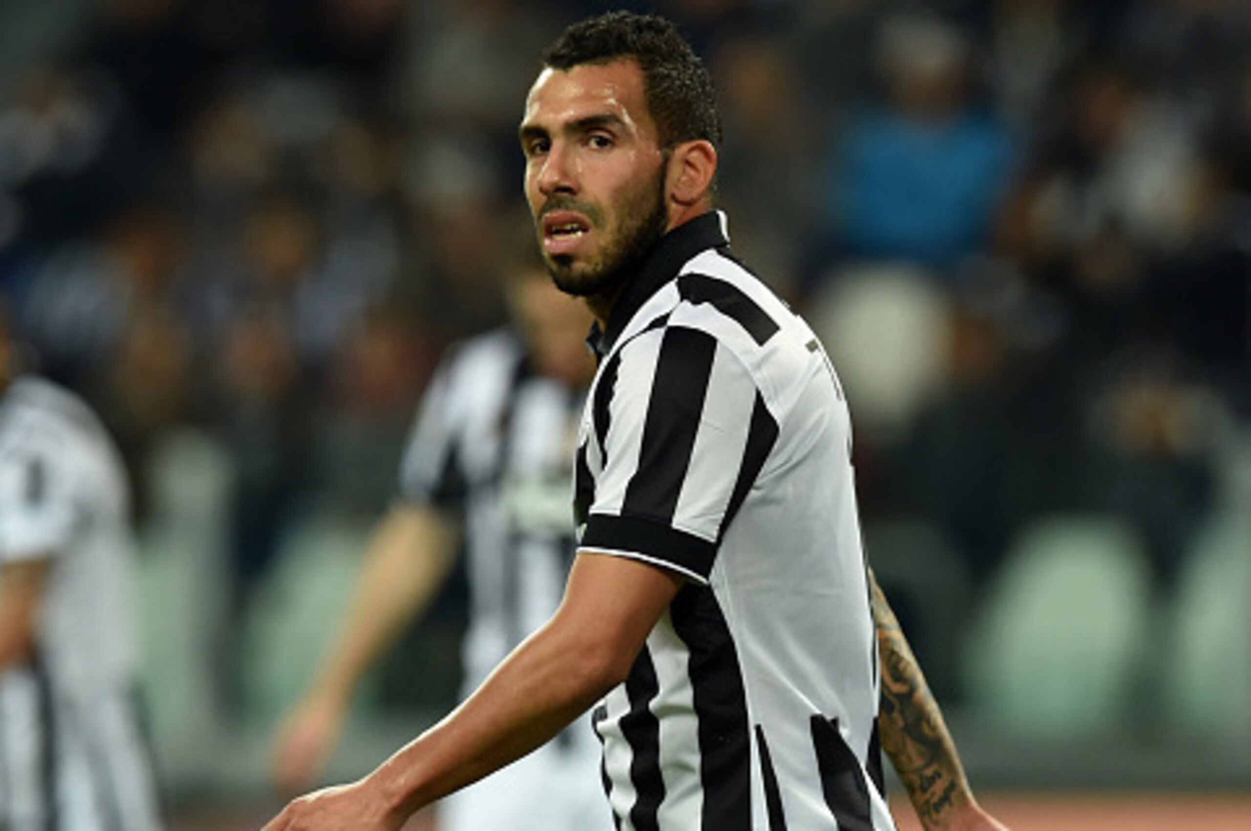 TURIN, ITALY - APRIL 04:  Carlos Tevez of Juventus FC looks on during the Serie A match between Juventus FC and Empoli FC at Juventus Arena on April 4, 2015 in Turin, Italy.  (Photo by Valerio Pennicino/Getty Images)