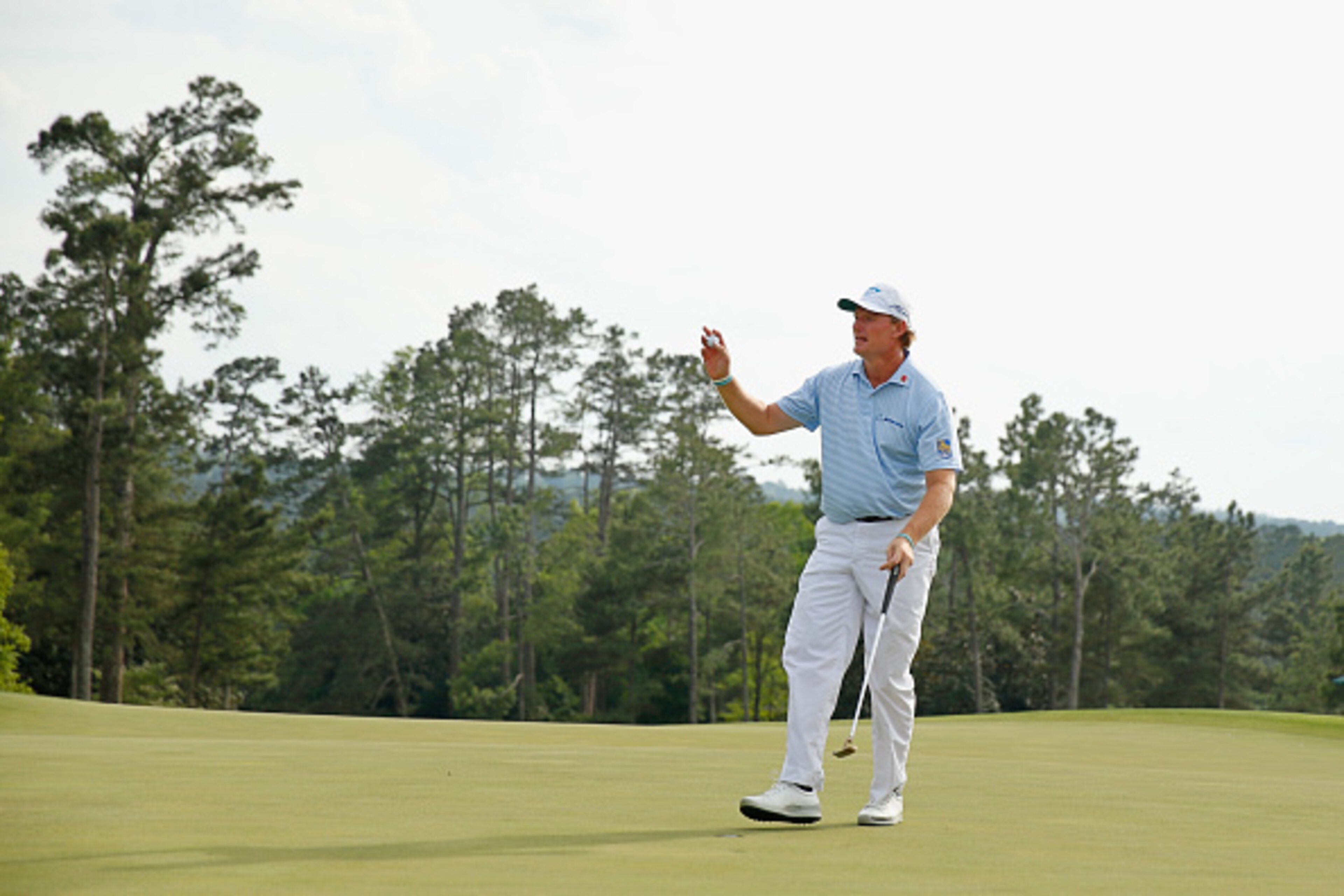 AUGUSTA, GA - APRIL 09:  Ernie Els of South Africa waves to the gallery on the 18th green during the first round of the 2015 Masters Tournament at Augusta National Golf Club on April 9, 2015 in Augusta, Georgia.  (Photo by Ezra Shaw/Getty Images)
