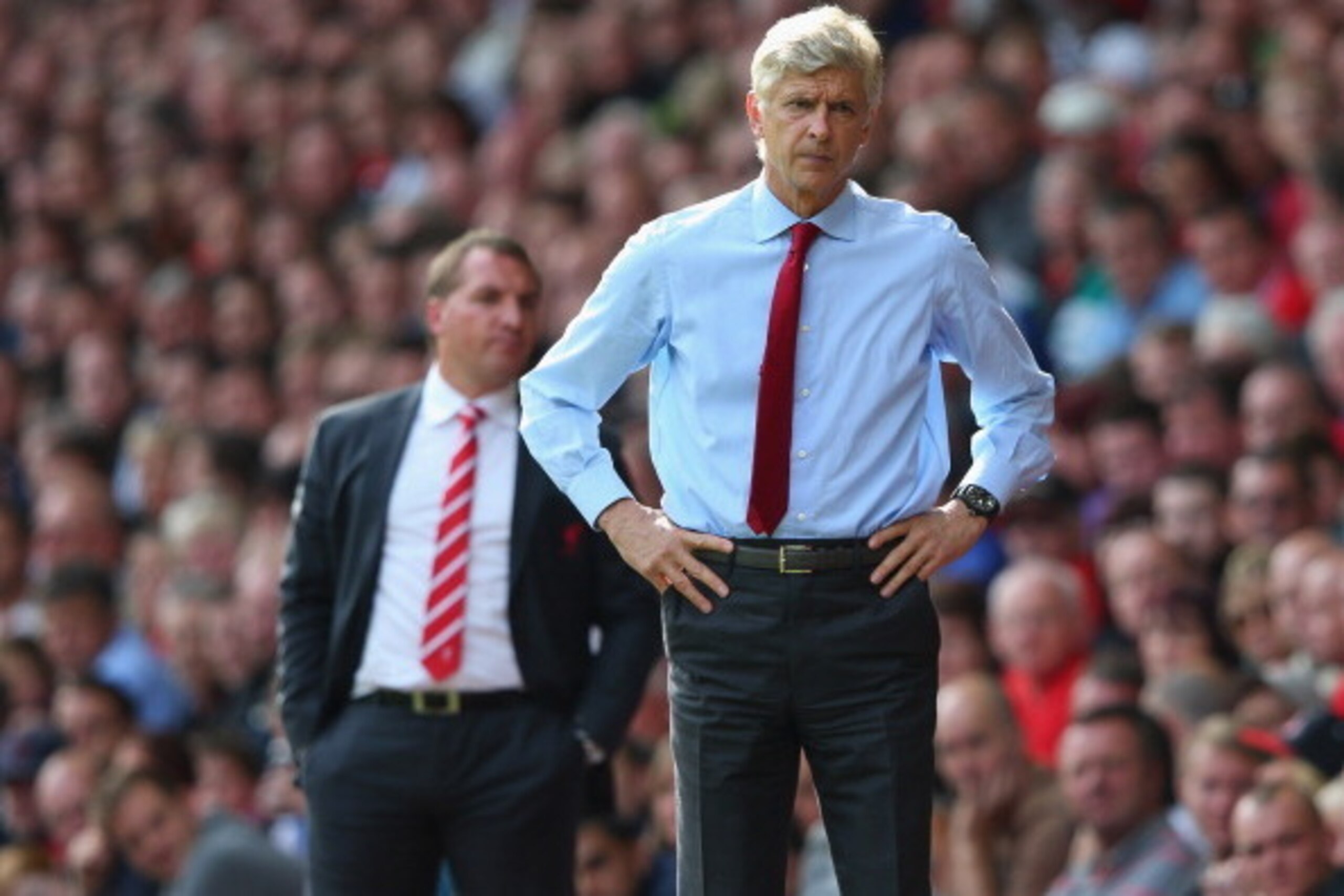 LIVERPOOL, ENGLAND - SEPTEMBER 02:  Arsene Wenger the manager of Arsenal and Brendan Rodgers the manager of Liverpool look on during the Barclays Premier League match between Liverpool and  Arsenal at Anfield on September 2, 2012 in Liverpool, England.  (