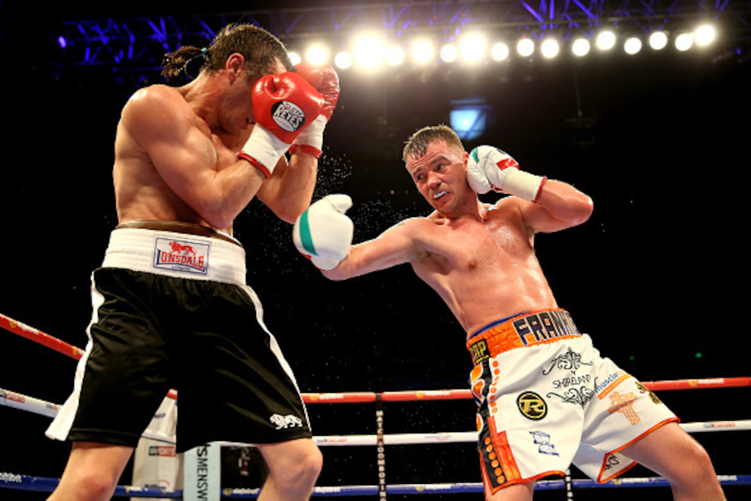 SHEFFIELD, ENGLAND - MARCH 28:  Frankie Gavin (R) of Great Britain fights Bogdan Mitic (L) of Serbia during a welterweight contest at Motorpoint Arena on March 28, 2015 in Sheffield, England.  (Photo by Richard Heathcote/Getty Images)