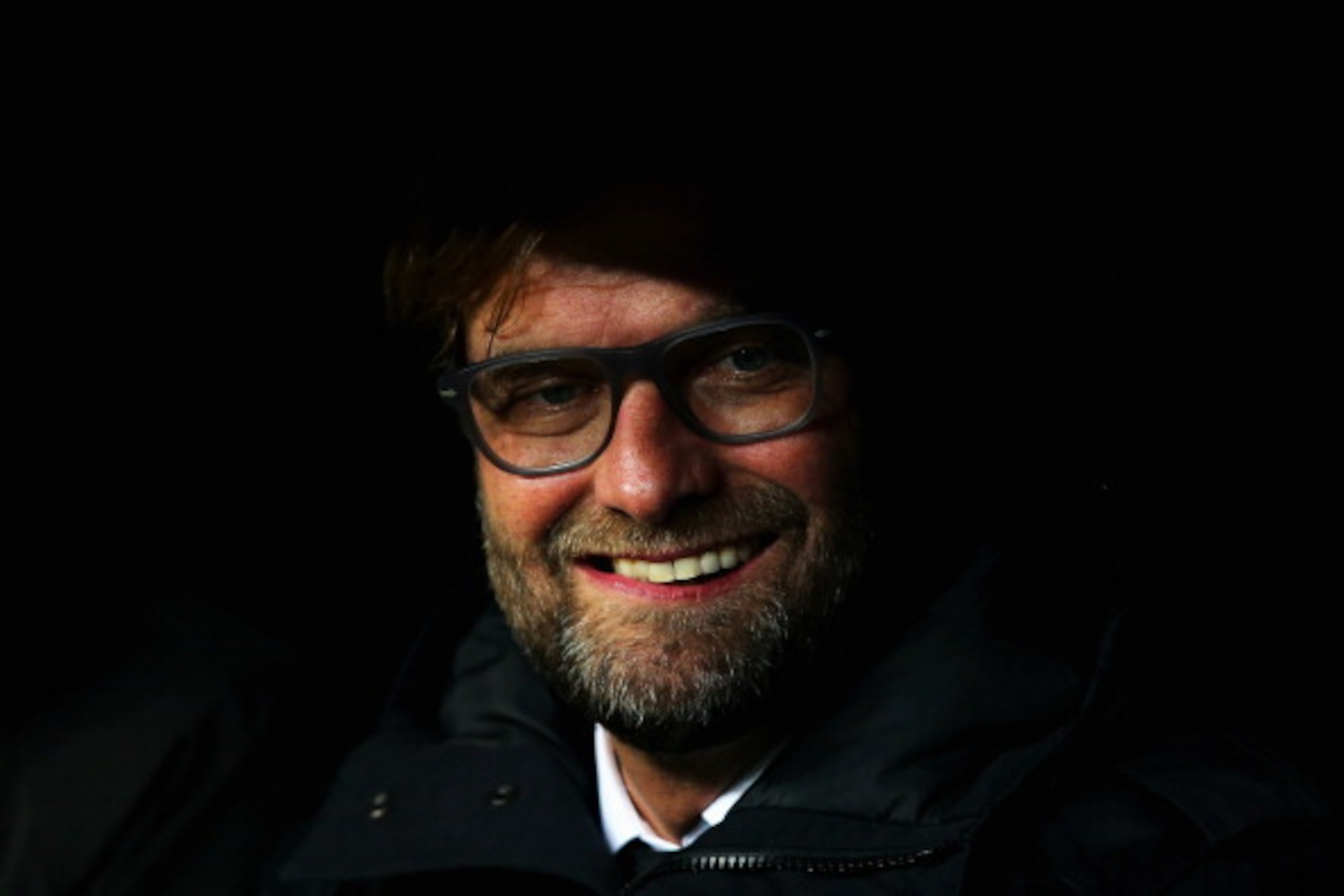MADRID, SPAIN - APRIL 02:  Juergen Klopp, Coach of Borussia Dortmund smiles during the UEFA Champions League Quarter Final first leg match between Real Madrid and Borussia Dortmund at Estadio Santiago Bernabeu on April 2, 2014 in Madrid, Spain.  (Photo by