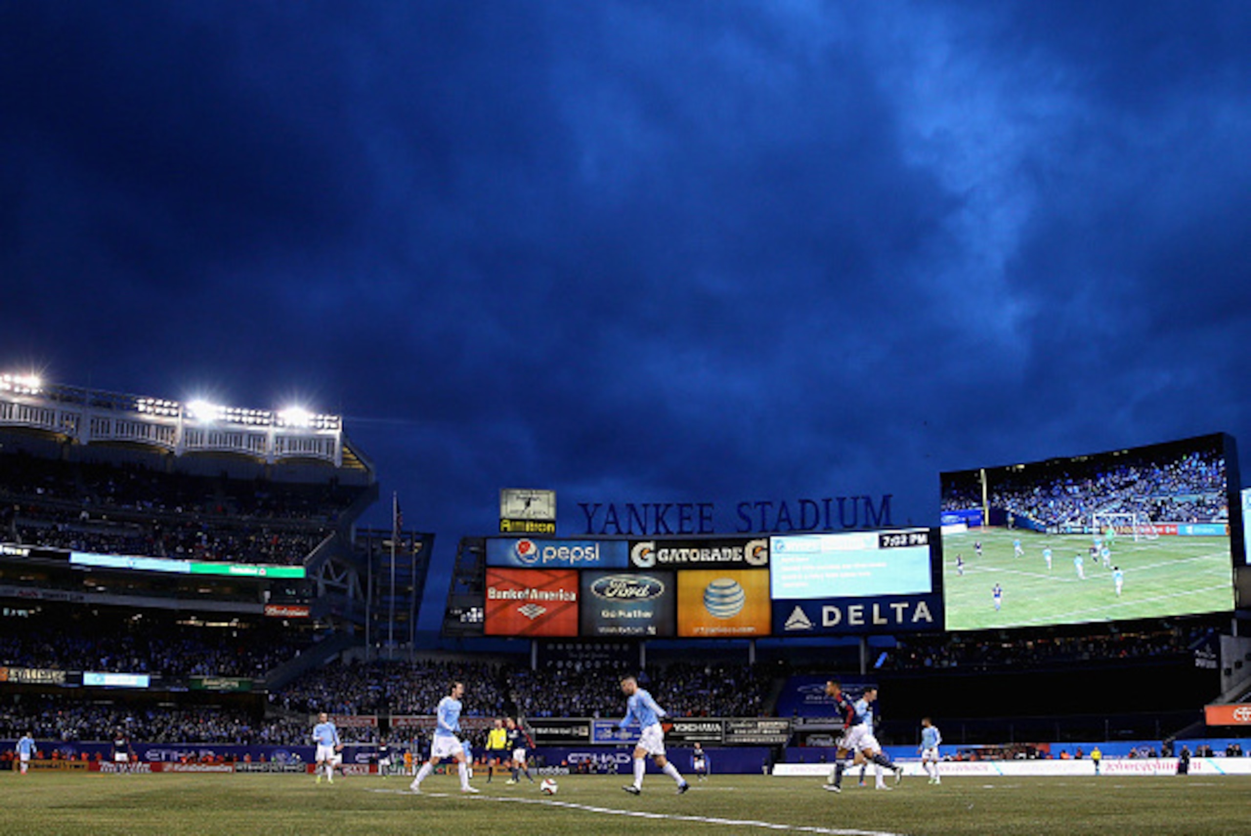 NEW YORK, NY - MARCH 15:  The New York City FC take on the New England Revolution during their inaugural game at Yankee Stadium on March 15, 2015 in the Bronx borough of New York City.The New York City FC defeated the New England Revolution 2-0.  (Photo b