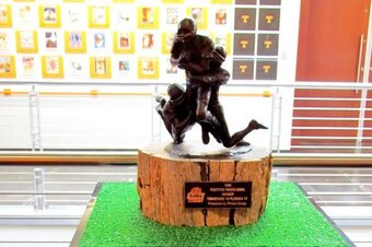 The trophy from the 1998 Fiesta Bowl, where the Vols won the national championship, is a constant reminder of greatness.
