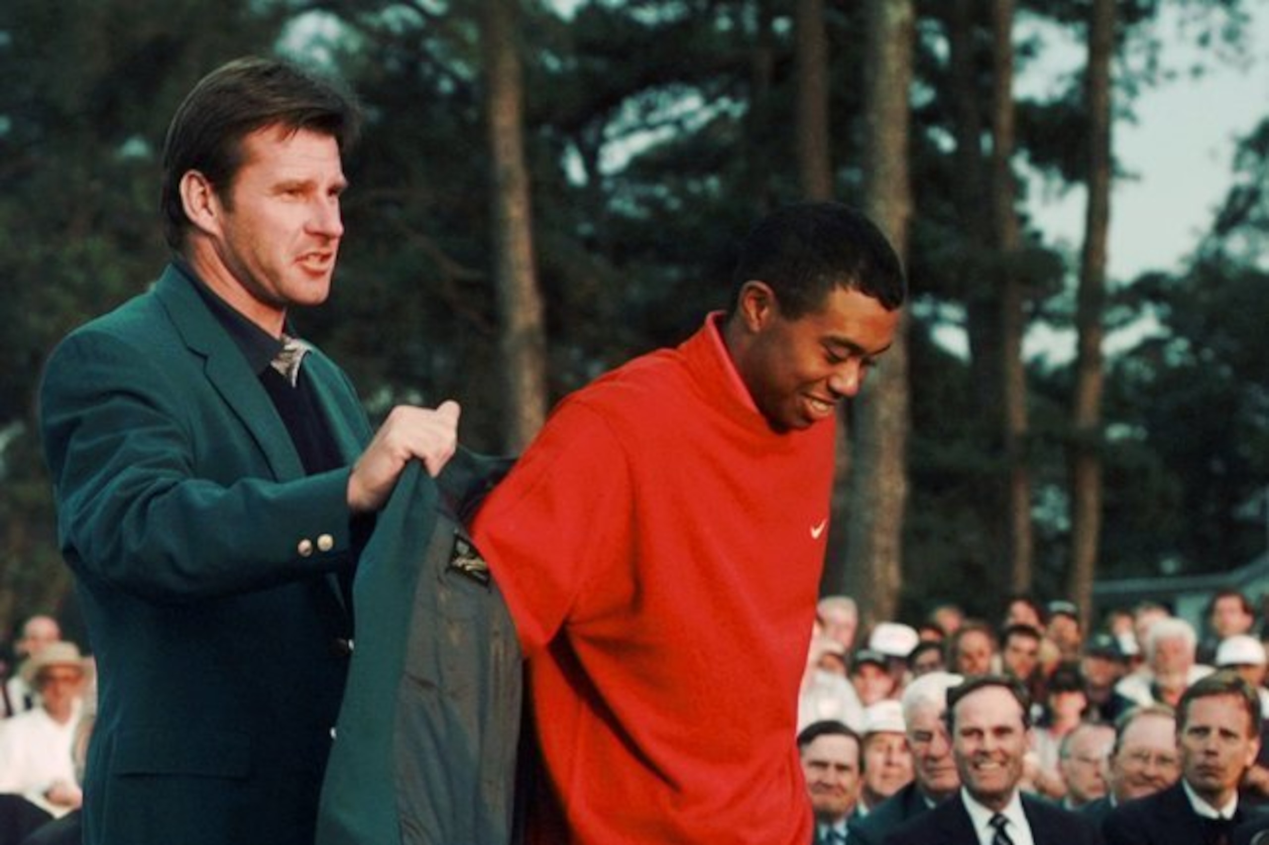 Tiger got help with his first green jacket from Nick Faldo.