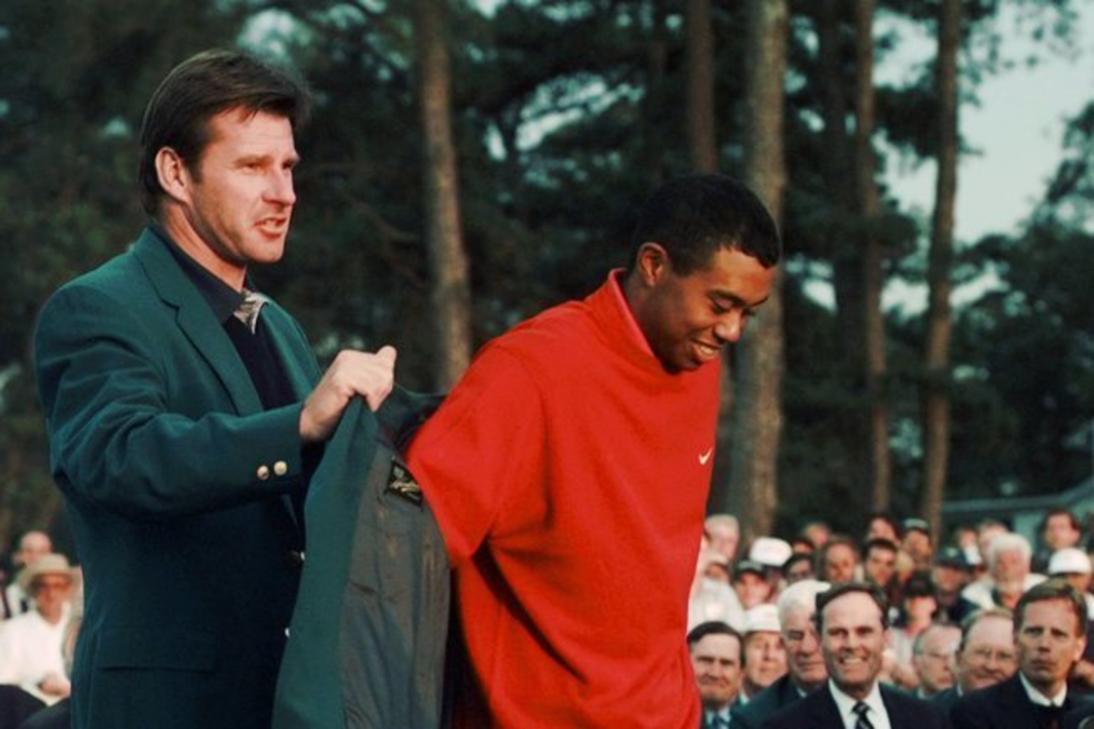 Tiger got help with his first green jacket from Nick Faldo.