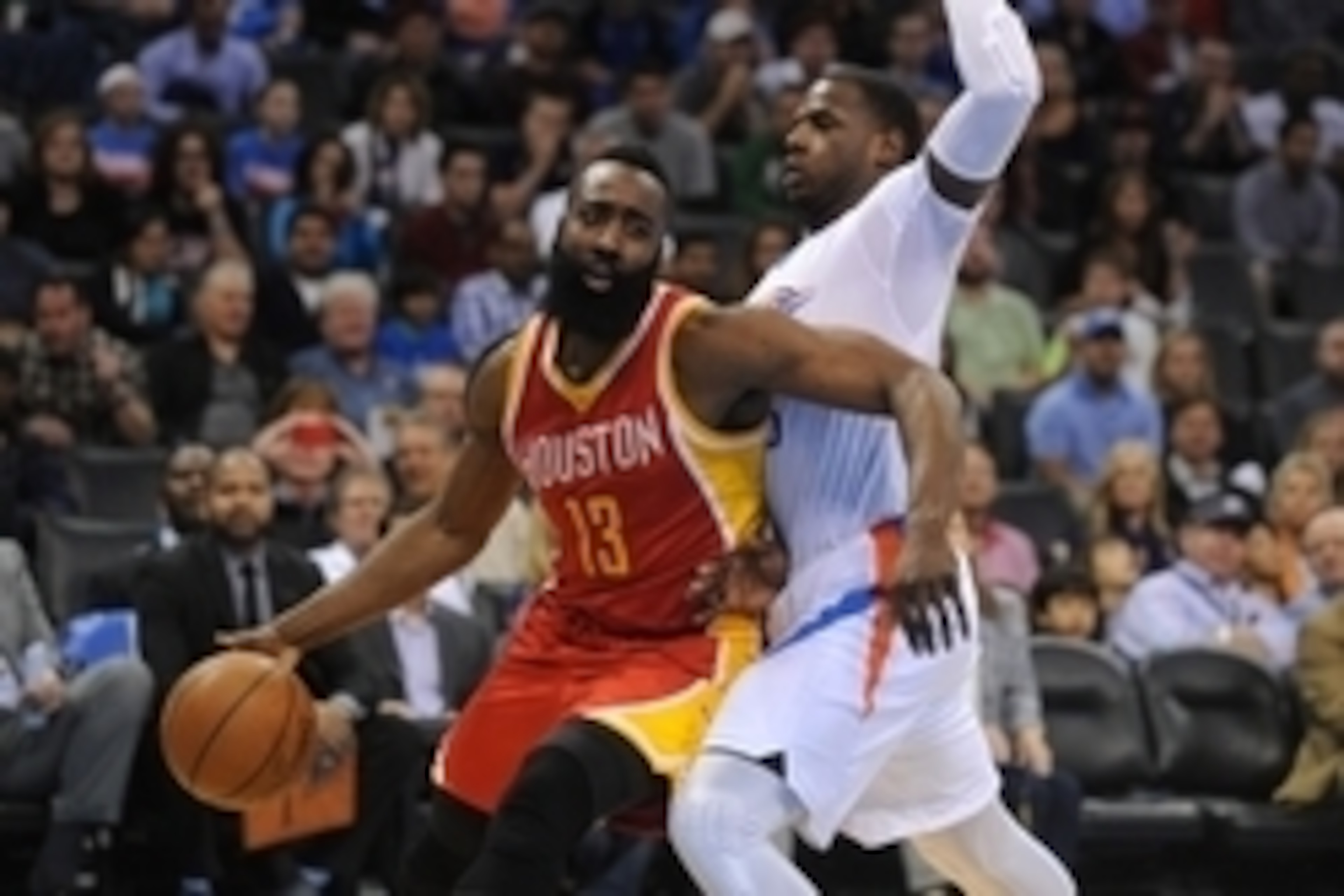 Apr 5, 2015; Oklahoma City, OK, USA; Houston Rockets guard James Harden (13) dribbles the ball as Oklahoma City Thunder guard Dion Waiters (23) defends during the first quarter at Chesapeake Energy Arena. Mandatory Credit: Mark D. Smith-USA TODAY Sports
