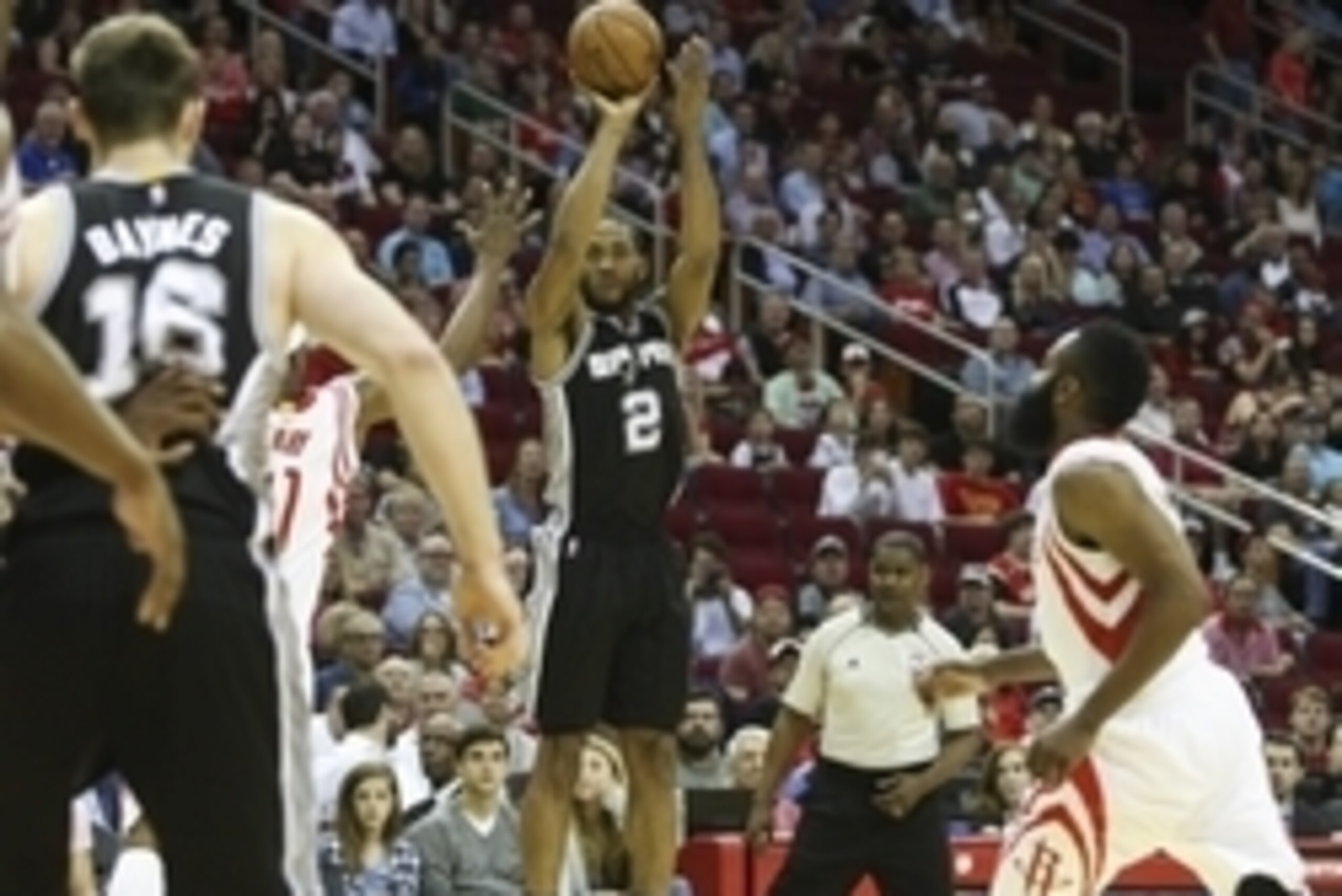 Apr 10, 2015; Houston, TX, USA; San Antonio Spurs forward Kawhi Leonard (2) shoots the ball during the first quarter against the Houston Rockets at Toyota Center. Mandatory Credit: Troy Taormina-USA TODAY Sports