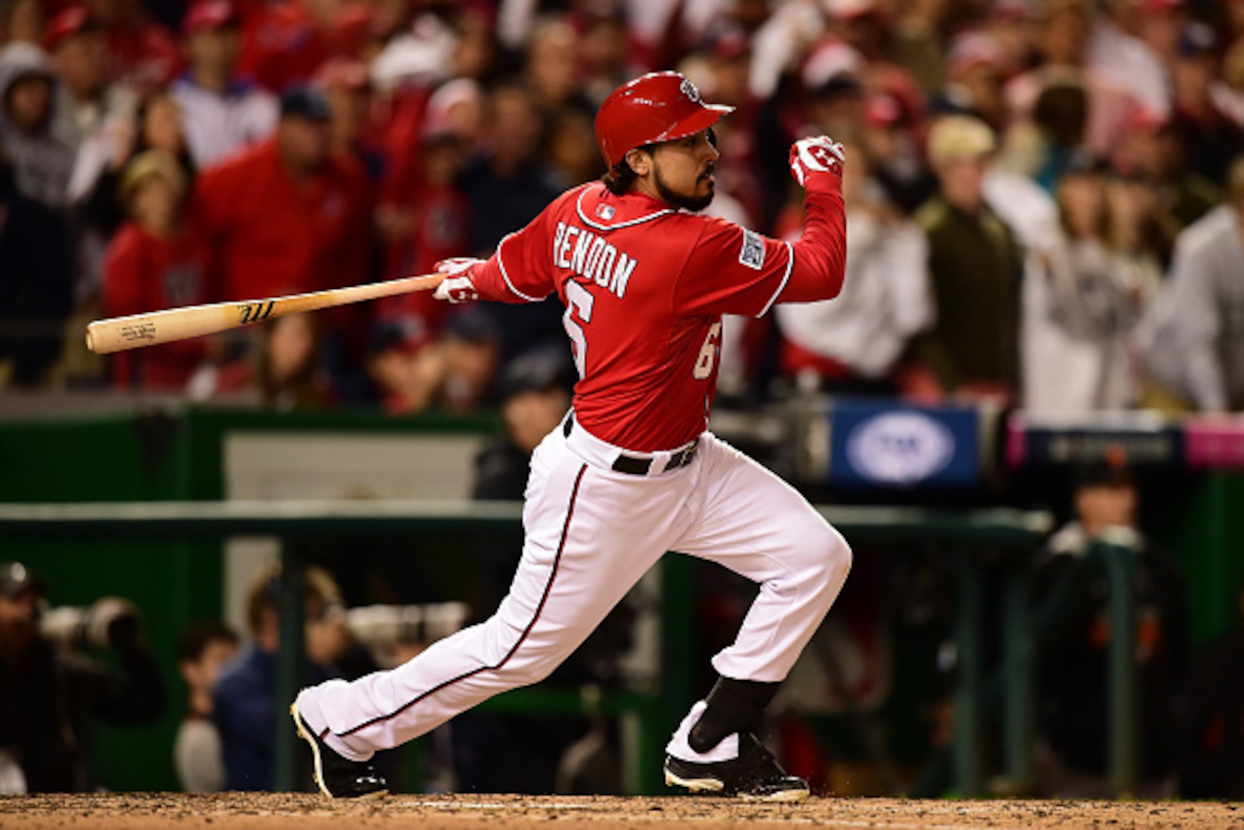 WASHINGTON, DC - OCTOBER 04: Anthony Rendon #6 of the Washington Nationals hits a single to center field against Tim Hudson #17 of the San Francisco Giants in the eighth inning during Game Two of the National League Division Series at Nationals Park on O WASHINGTON, DC - OCTOBER 04: Anthony Rendon #6 of the Washington Nationals hits a single to center field against Tim Hudson #17 of the San Francisco Giants in the eighth inning during Game Two of the National League Division Series at Nationals Park on O
