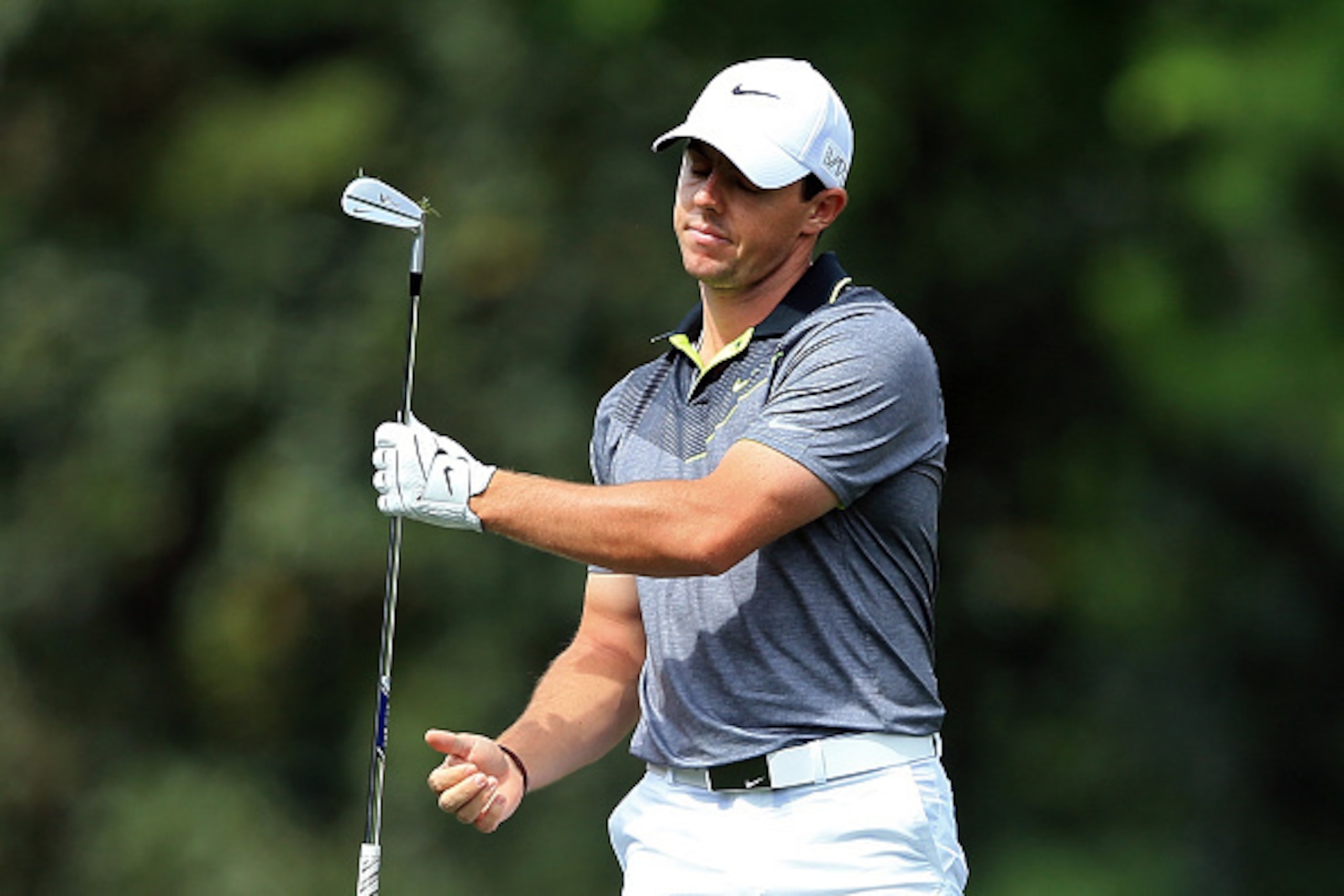 AUGUSTA, GA - APRIL 10:  Rory McIlroy of Northern Ireland reacts to a poor second shot on the fifth hole during the second round of the 2015 Masters Tournament at Augusta National Golf Club on April 10, 2015 in Augusta, Georgia.  (Photo by David Cannon/Ge