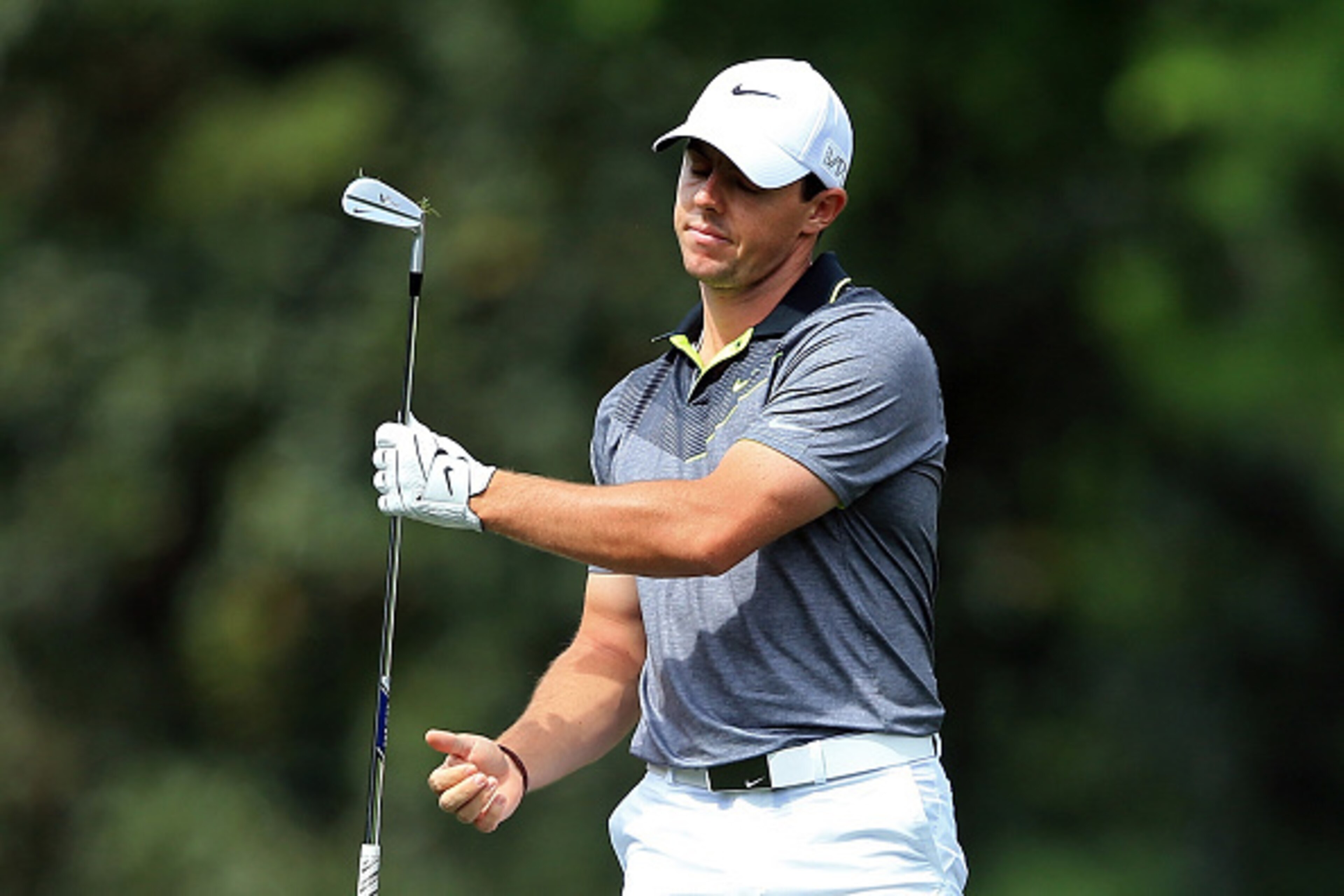 AUGUSTA, GA - APRIL 10: Rory McIlroy of Northern Ireland reacts to a poor second shot on the fifth hole during the second round of the 2015 Masters Tournament at Augusta National Golf Club on April 10, 2015 in Augusta, Georgia. (Photo by David Cannon/Ge AUGUSTA, GA - APRIL 10: Rory McIlroy of Northern Ireland reacts to a poor second shot on the fifth hole during the second round of the 2015 Masters Tournament at Augusta National Golf Club on April 10, 2015 in Augusta, Georgia. (Photo by David Cannon/Ge