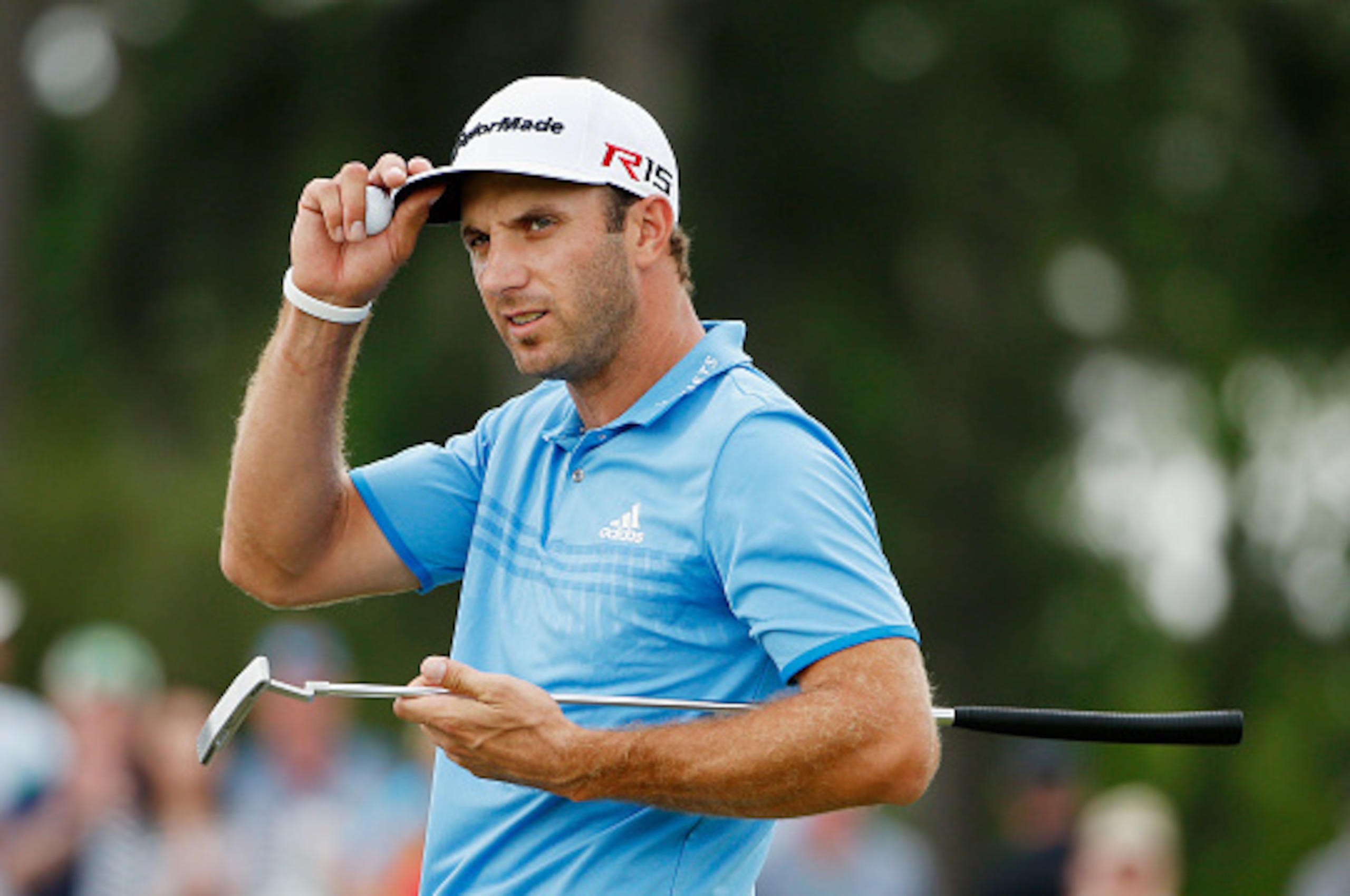 AUGUSTA, GA - APRIL 10: Dustin Johnson of the United States walks across the 18th green during the second round of the 2015 Masters Tournament at Augusta National Golf Club on April 10, 2015 in Augusta, Georgia. (Photo by Ezra Shaw/Getty Images) AUGUSTA, GA - APRIL 10: Dustin Johnson of the United States walks across the 18th green during the second round of the 2015 Masters Tournament at Augusta National Golf Club on April 10, 2015 in Augusta, Georgia. (Photo by Ezra Shaw/Getty Images)