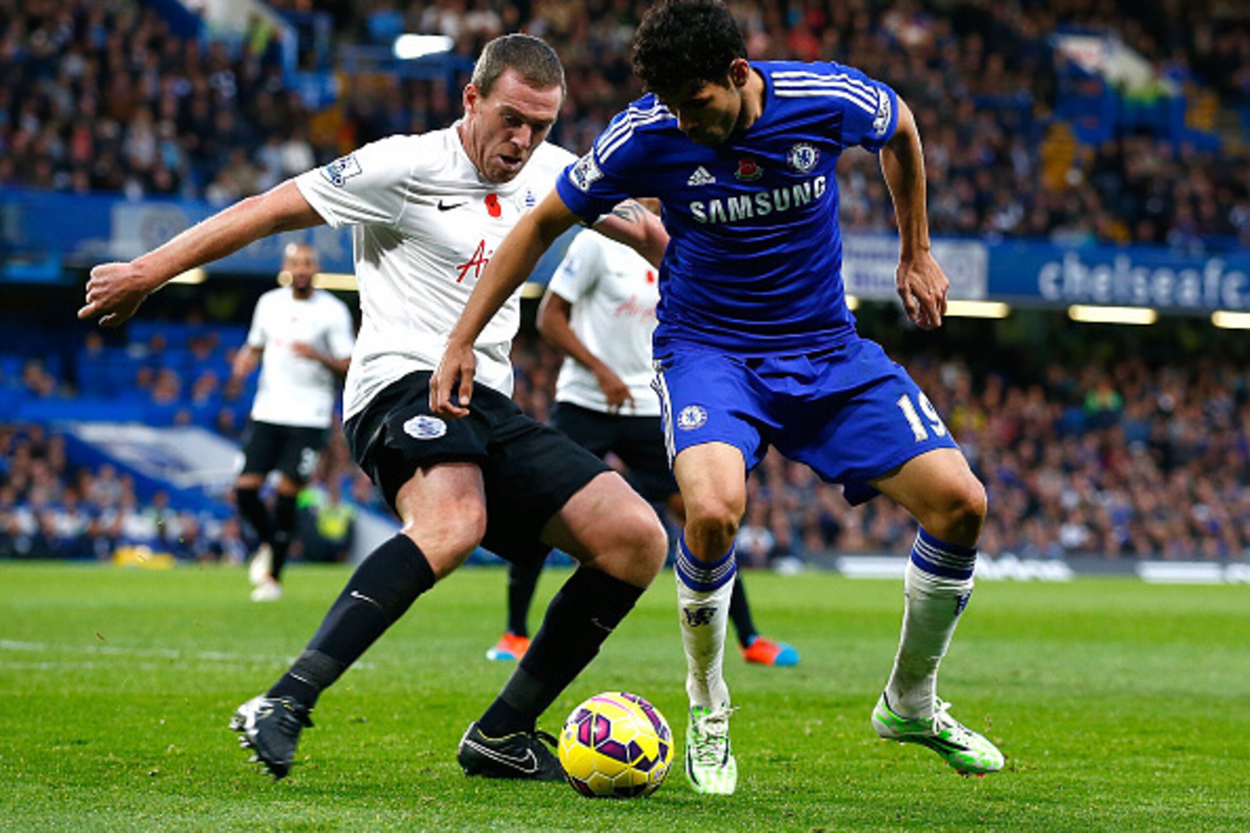 LONDON, ENGLAND - NOVEMBER 1: Richard Dunne of Queens Park Rangers and Diego Costa of Chelsea in action during the Barclays Premier League match between Chelsea and Queens Park Rangers at Stamford Bridge on November 1, 2014 in London, England. (Photo by C LONDON, ENGLAND - NOVEMBER 1: Richard Dunne of Queens Park Rangers and Diego Costa of Chelsea in action during the Barclays Premier League match between Chelsea and Queens Park Rangers at Stamford Bridge on November 1, 2014 in London, England. (Photo by C