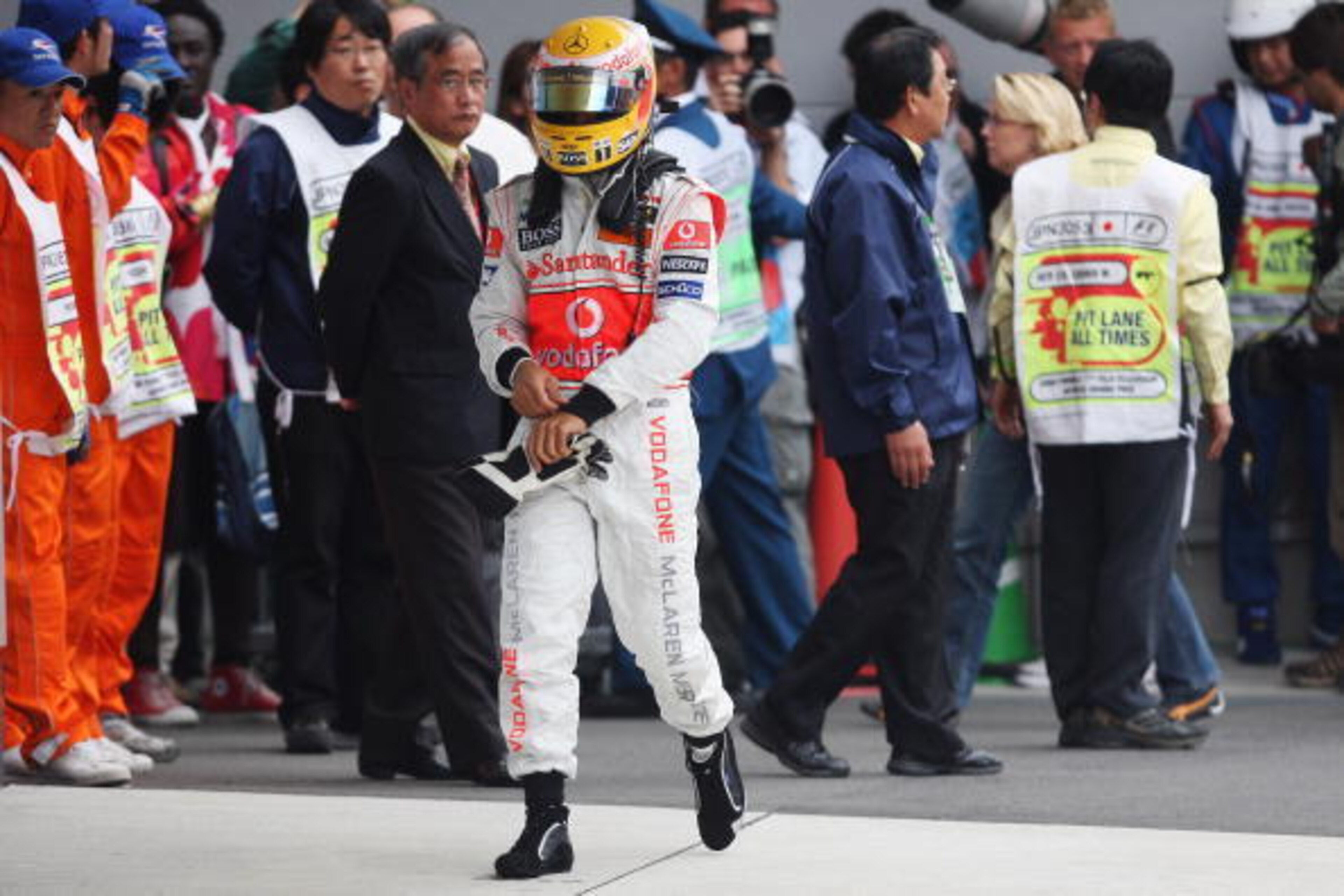 SHIZUOKA, JAPAN - OCTOBER 12:  Lewis Hamilton of Great Britain and McLaren Mercedes is seen walking back to his garage after finishing twelth in the Japanese Formula One Grand Prix at the Fuji Speedway on October 12, 2008 in Shizuoka, Japan.  (Photo by Ma