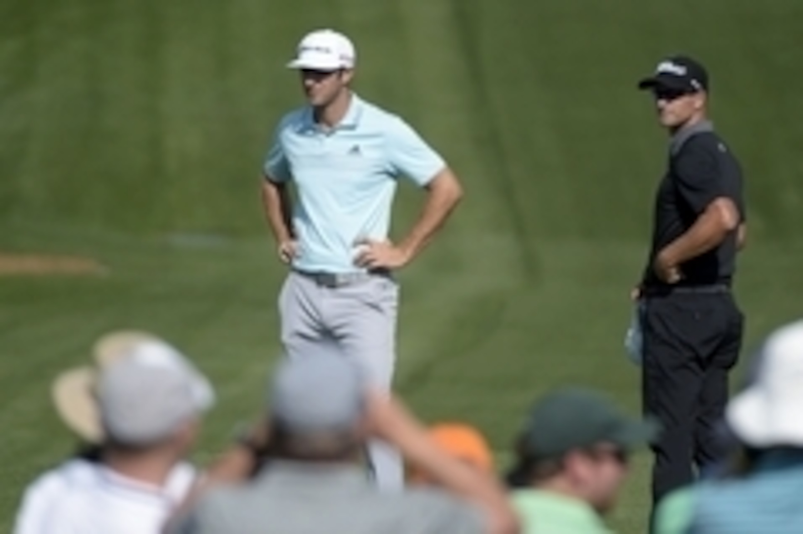 Apr 9, 2015; Augusta, GA, USA; Dustin Johnson (left) and Adam Scott on the 3rd tee during the first round of The Masters at Augusta National Golf Club. Mandatory Credit: Michael Madrid-USA TODAY Sports