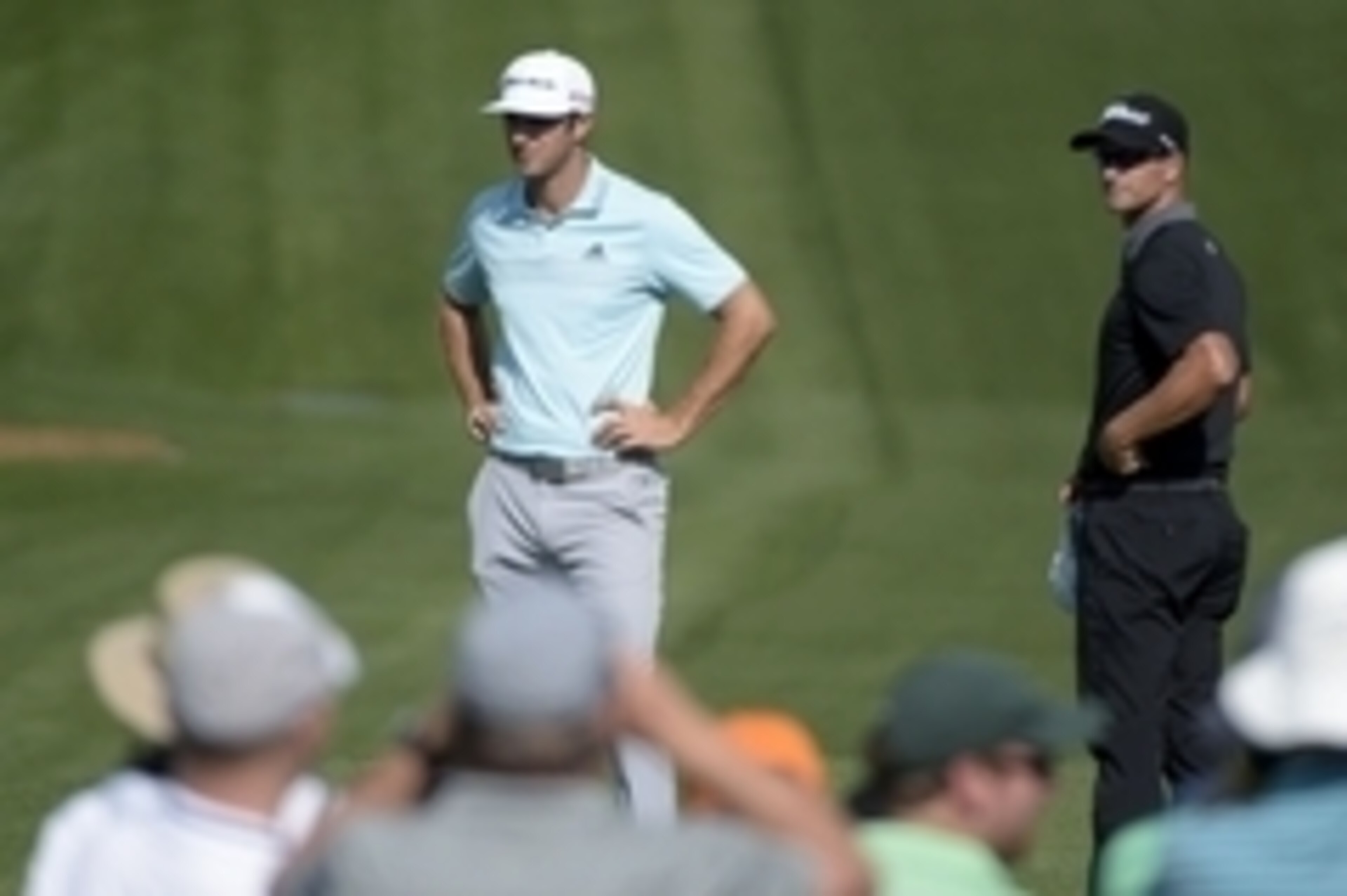 Apr 9, 2015; Augusta, GA, USA; Dustin Johnson (left) and Adam Scott on the 3rd tee during the first round of The Masters at Augusta National Golf Club. Mandatory Credit: Michael Madrid-USA TODAY Sports