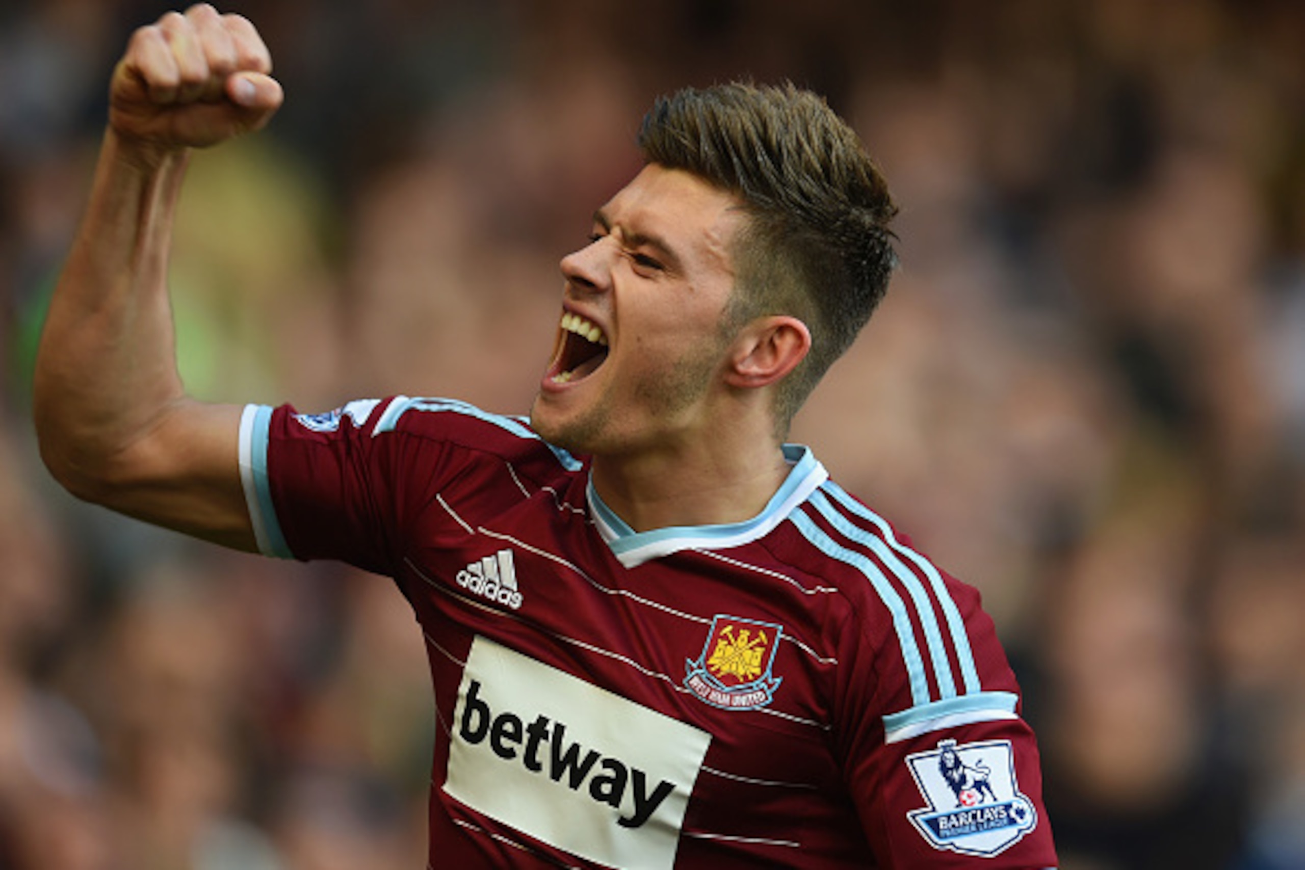LONDON, ENGLAND - APRIL 11: Aaron Cresswell of West Ham celebrates scoring the first goal during the Barclays Premier League match between West Ham United and Stoke City at Boleyn Ground on April 11, 2015 in London, England.  (Photo by Tom Dulat/Getty Ima