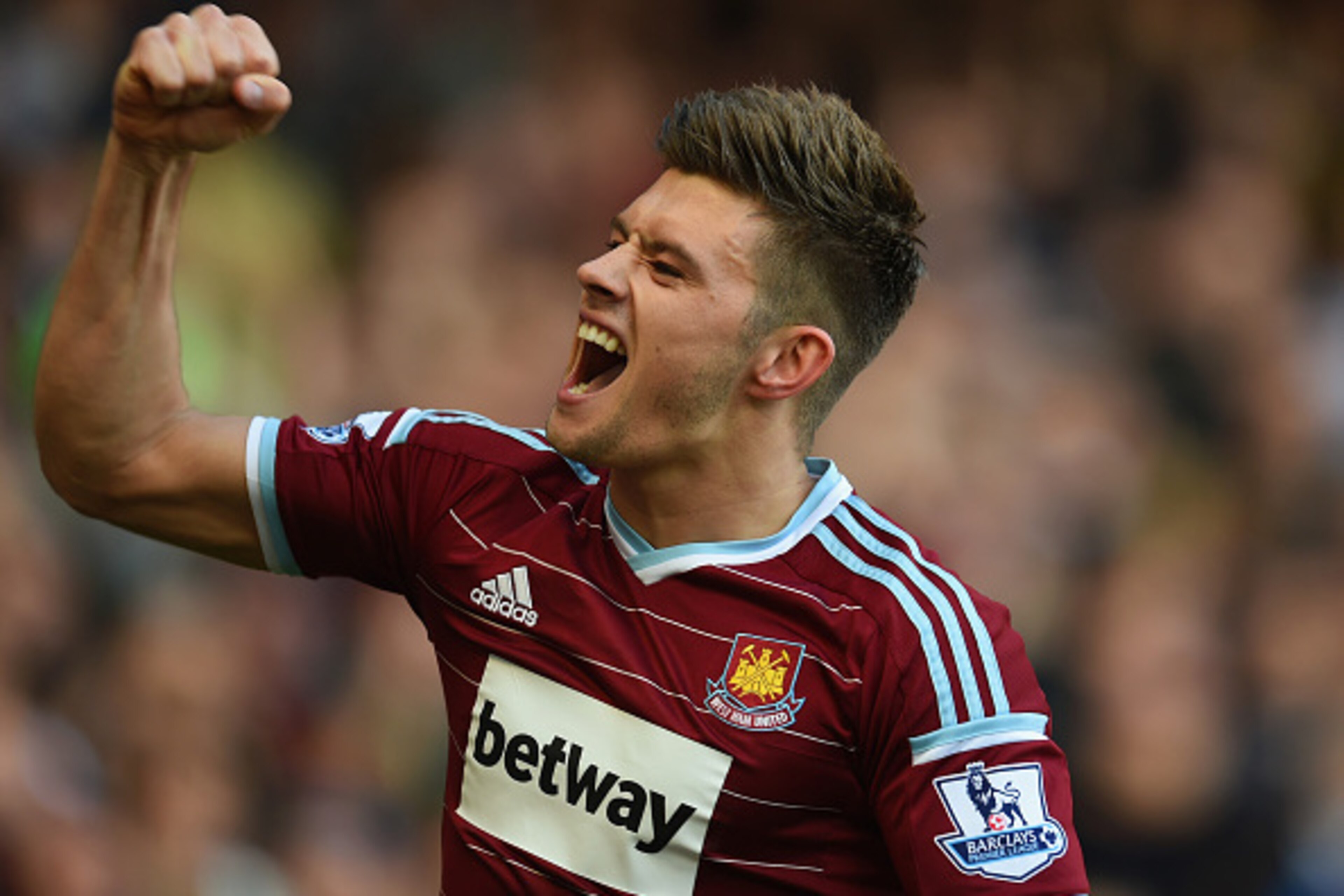 LONDON, ENGLAND - APRIL 11: Aaron Cresswell of West Ham celebrates scoring the first goal during the Barclays Premier League match between West Ham United and Stoke City at Boleyn Ground on April 11, 2015 in London, England.  (Photo by Tom Dulat/Getty Ima