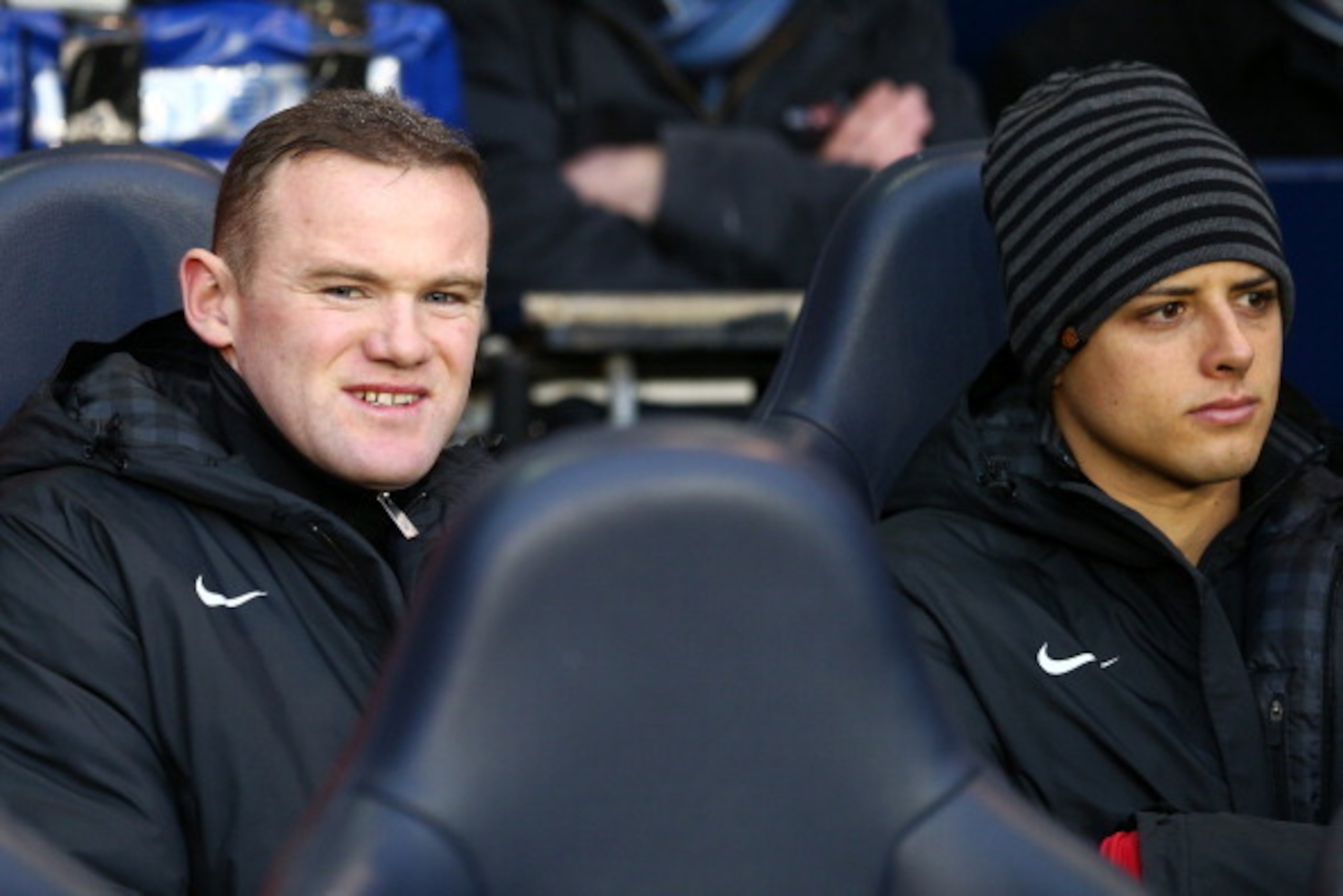 LONDON, ENGLAND - JANUARY 20: Wayne Rooney of Manchester United and Javier Hernandez of Manchester United are seen on the substitutes bench during the Barclays Premier League match between Tottenham Hotspur and Manchester United at White Hart Lane on Jan LONDON, ENGLAND - JANUARY 20: Wayne Rooney of Manchester United and Javier Hernandez of Manchester United are seen on the substitutes bench during the Barclays Premier League match between Tottenham Hotspur and Manchester United at White Hart Lane on Jan