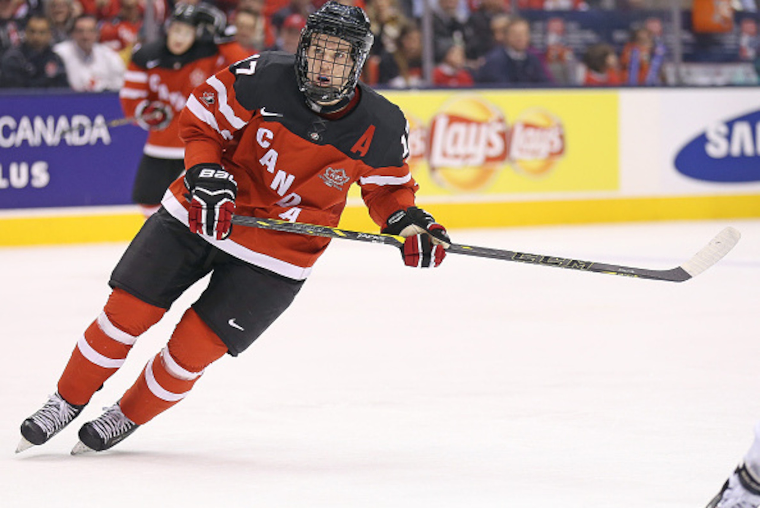 TORONTO, ON - JANUARY 4: Connor McDavid #17 of Team Canada skates against Team Slovakia during a semi-final game at the 2015 IIHF World Junior Hockey Championship at the Air Canada Centre on January 4, 2015 in Toronto, Ontario, Canada. Team Canada defeat TORONTO, ON - JANUARY 4: Connor McDavid #17 of Team Canada skates against Team Slovakia during a semi-final game at the 2015 IIHF World Junior Hockey Championship at the Air Canada Centre on January 4, 2015 in Toronto, Ontario, Canada. Team Canada defeat