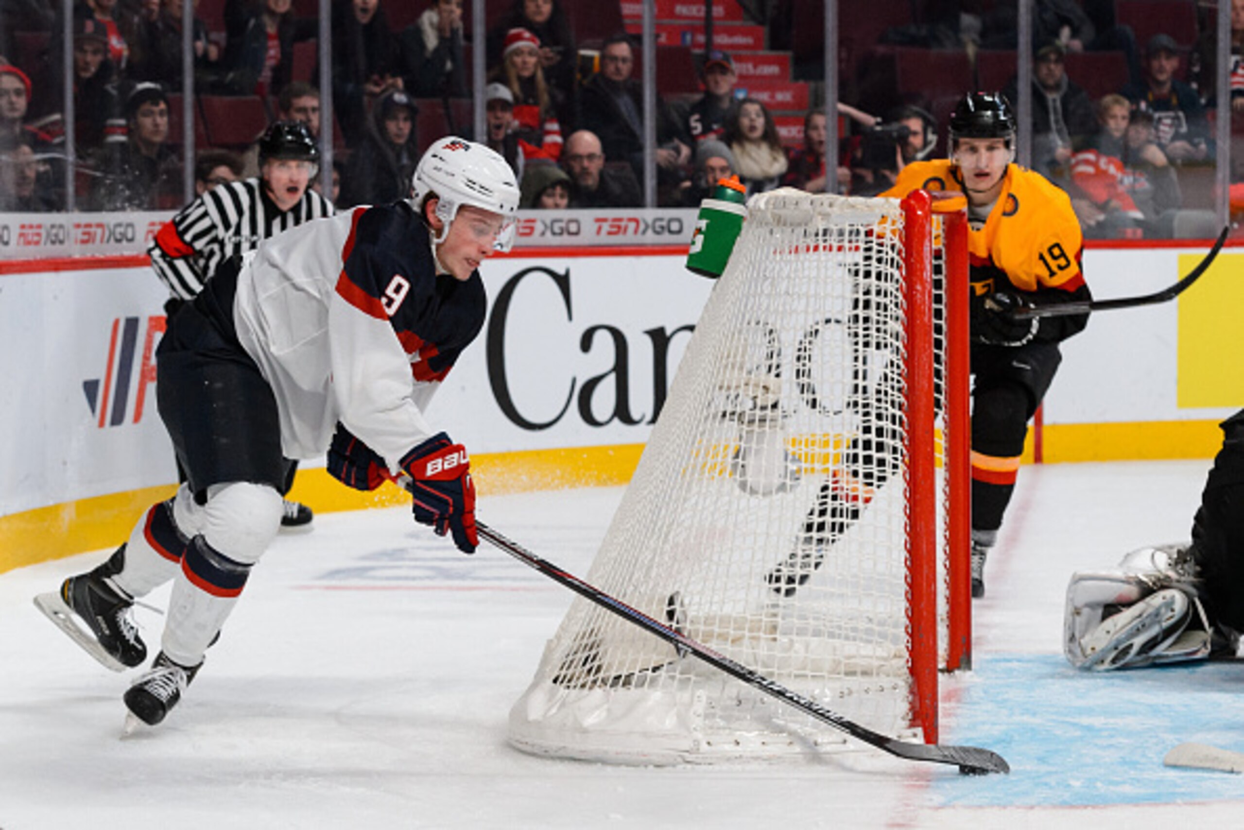 MONTREAL, QC - DECEMBER 28: Jack Eichel #9 of Team United States wraps around the net and scores his first goal of the tournament during the 2015 IIHF World Junior Hockey Championship game against Team Germany at the Bell Centre on December 28, 2014 in M MONTREAL, QC - DECEMBER 28: Jack Eichel #9 of Team United States wraps around the net and scores his first goal of the tournament during the 2015 IIHF World Junior Hockey Championship game against Team Germany at the Bell Centre on December 28, 2014 in M
