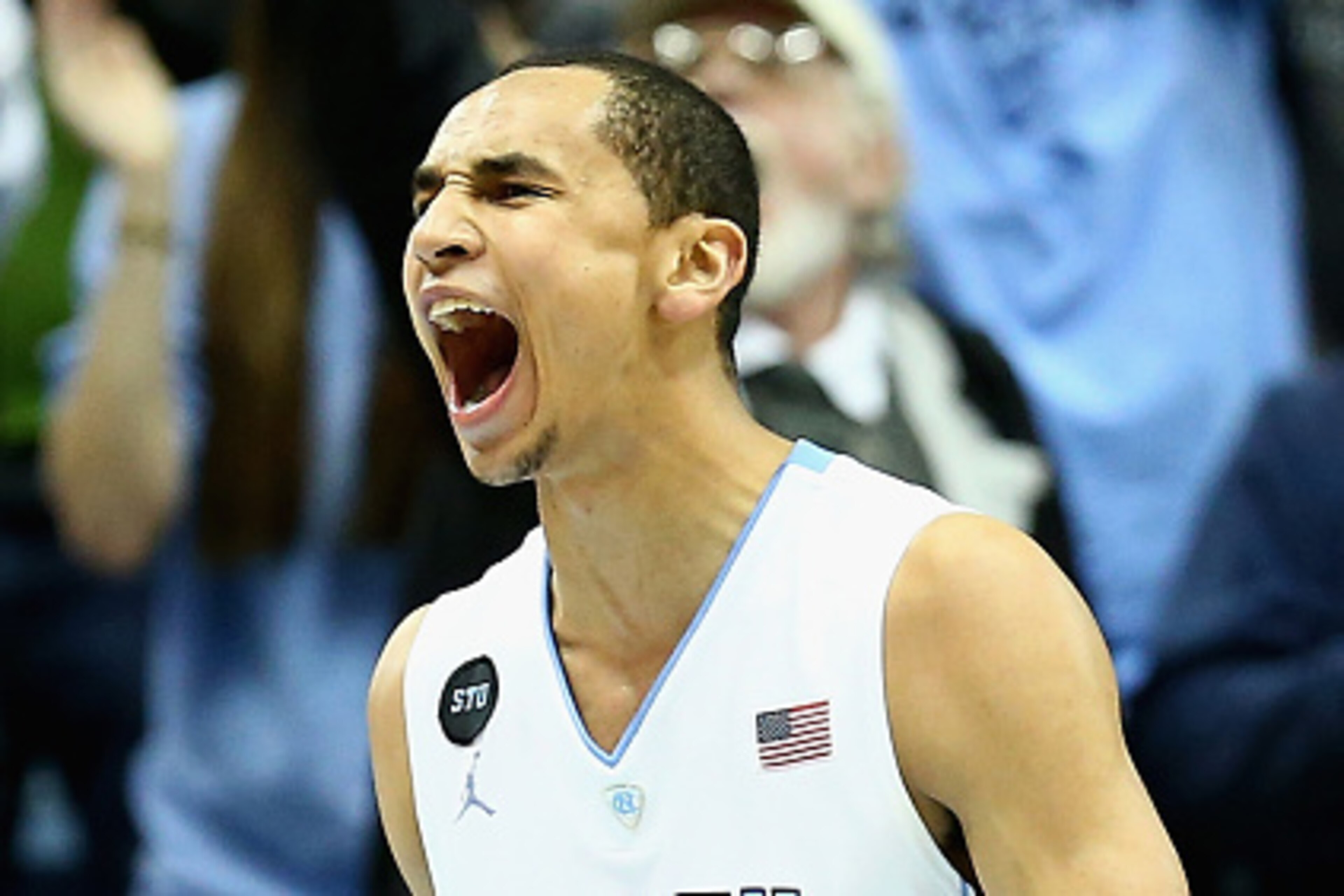 CHAPEL HILL, NC - JANUARY 05:  Marcus Paige #5 of the North Carolina Tar Heels reacts after a basket against the Notre Dame Fighting Irish during their game at Dean Smith Center on January 5, 2015 in Chapel Hill, North Carolina.  (Photo by Streeter Lecka/