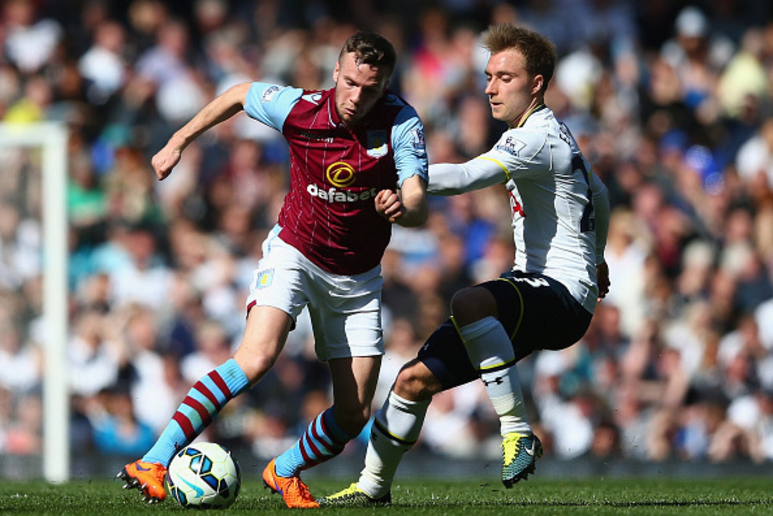 LONDON, ENGLAND - APRIL 11:  Tom Cleverley of Aston Villa is challenged by Christian Eriksen of Spurs during the Barclays Premier League match between Tottenham Hotspur and Aston Villa at White Hart Lane on April 11, 2015 in London, England.  (Photo by Ma