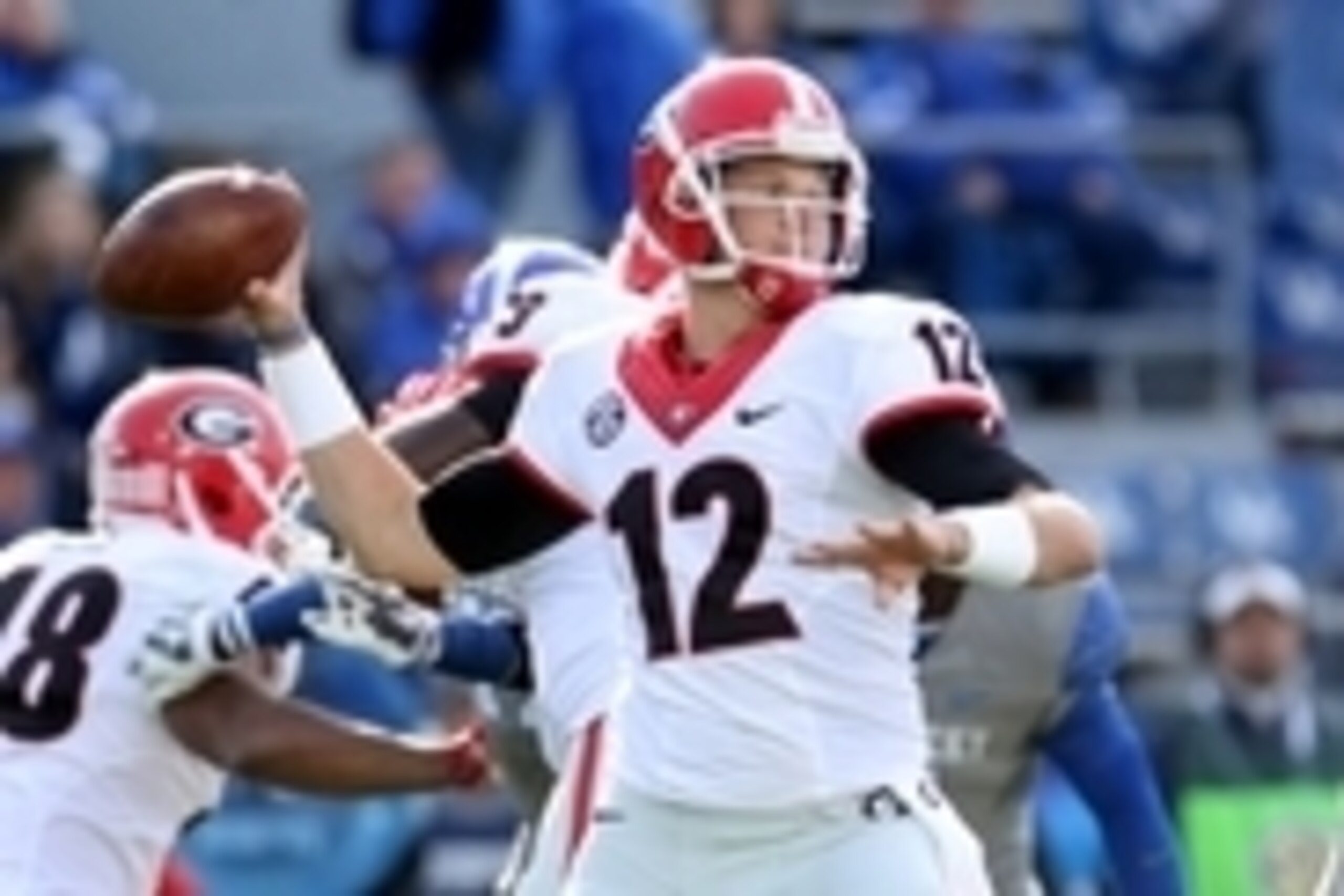 Nov 8, 2014; Lexington, KY, USA; Georgia Bulldogs quarterback Brice Ramsey (12) throws a pass against the Kentucky Wildcats in the second half at Commonwealth Stadium. Georgia defeated Kentucky 63-31. Mandatory Credit: Mark Zerof-USA TODAY Sports