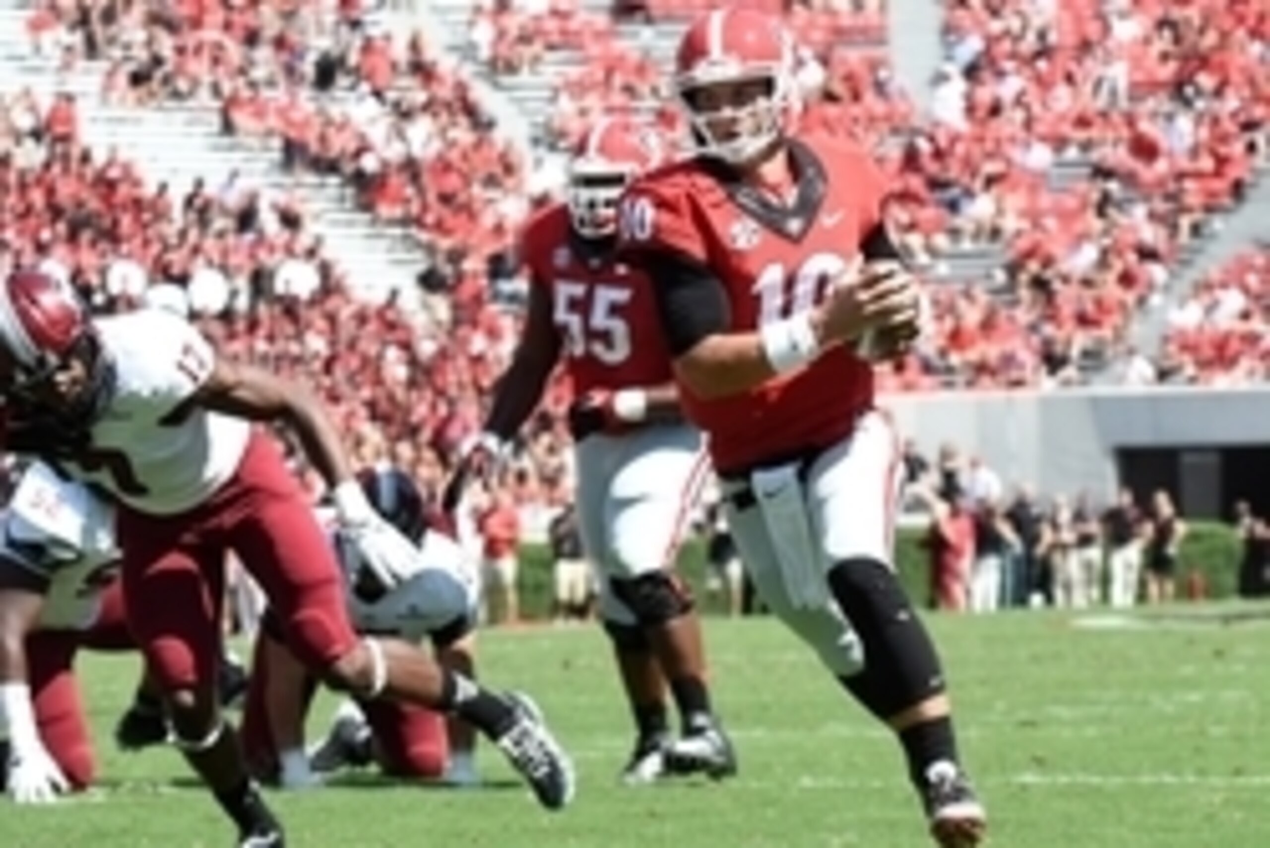 Sep 20, 2014; Athens, GA, USA; Georgia Bulldogs quarterback Faton Bauta (10) runs for a touchdown against the Troy Trojans during the second half at Sanford Stadium. Georgia defeated Troy 66-0. Mandatory Credit: Dale Zanine-USA TODAY Sports