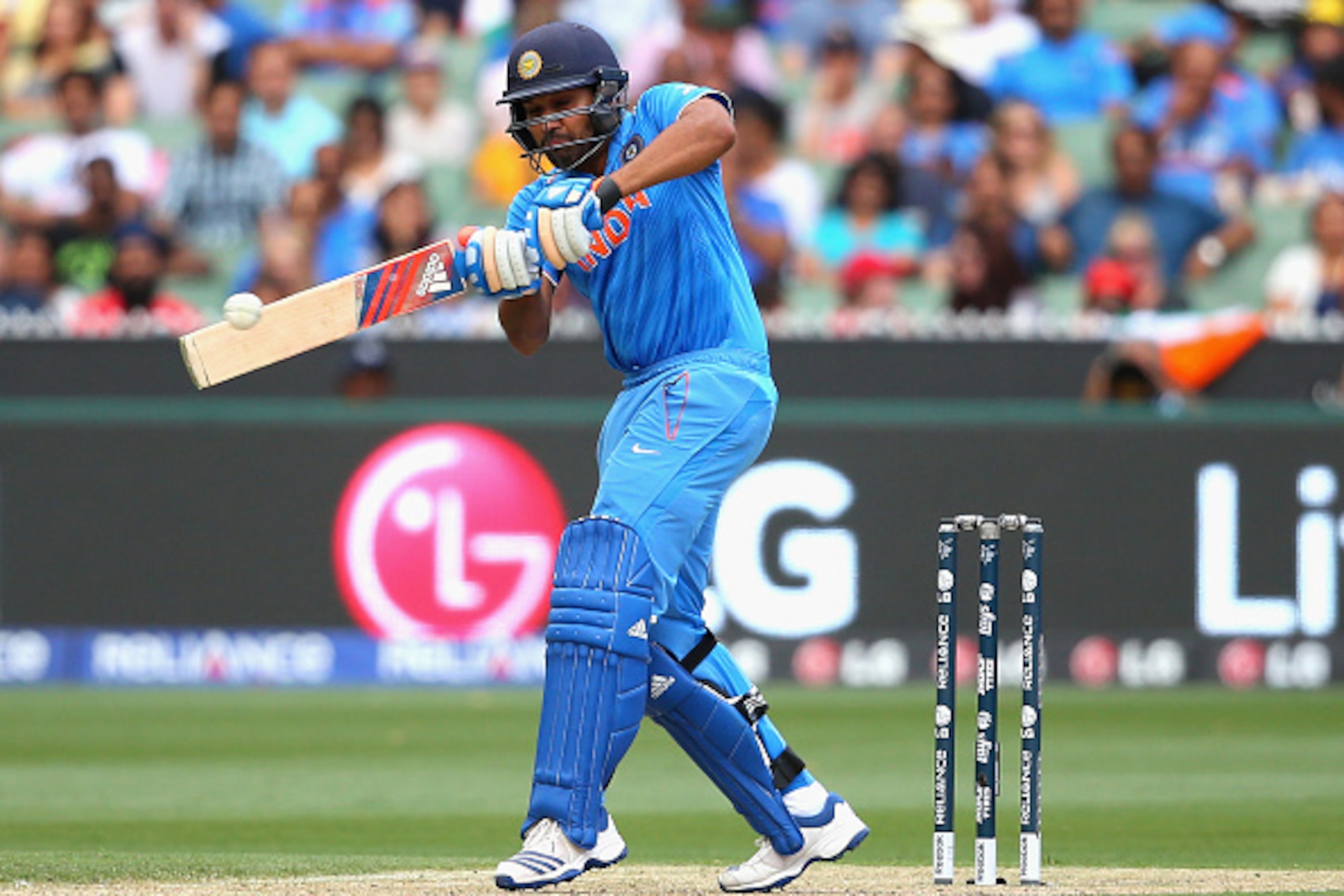 MELBOURNE, AUSTRALIA - MARCH 19:  Rohit Sharma of India bats during the 2015 ICC Cricket World Cup Quater Final match between India and Bangldesh at Melbourne Cricket Ground on March 19, 2015 in Melbourne, Australia.  (Photo by Quinn Rooney/Getty Images)