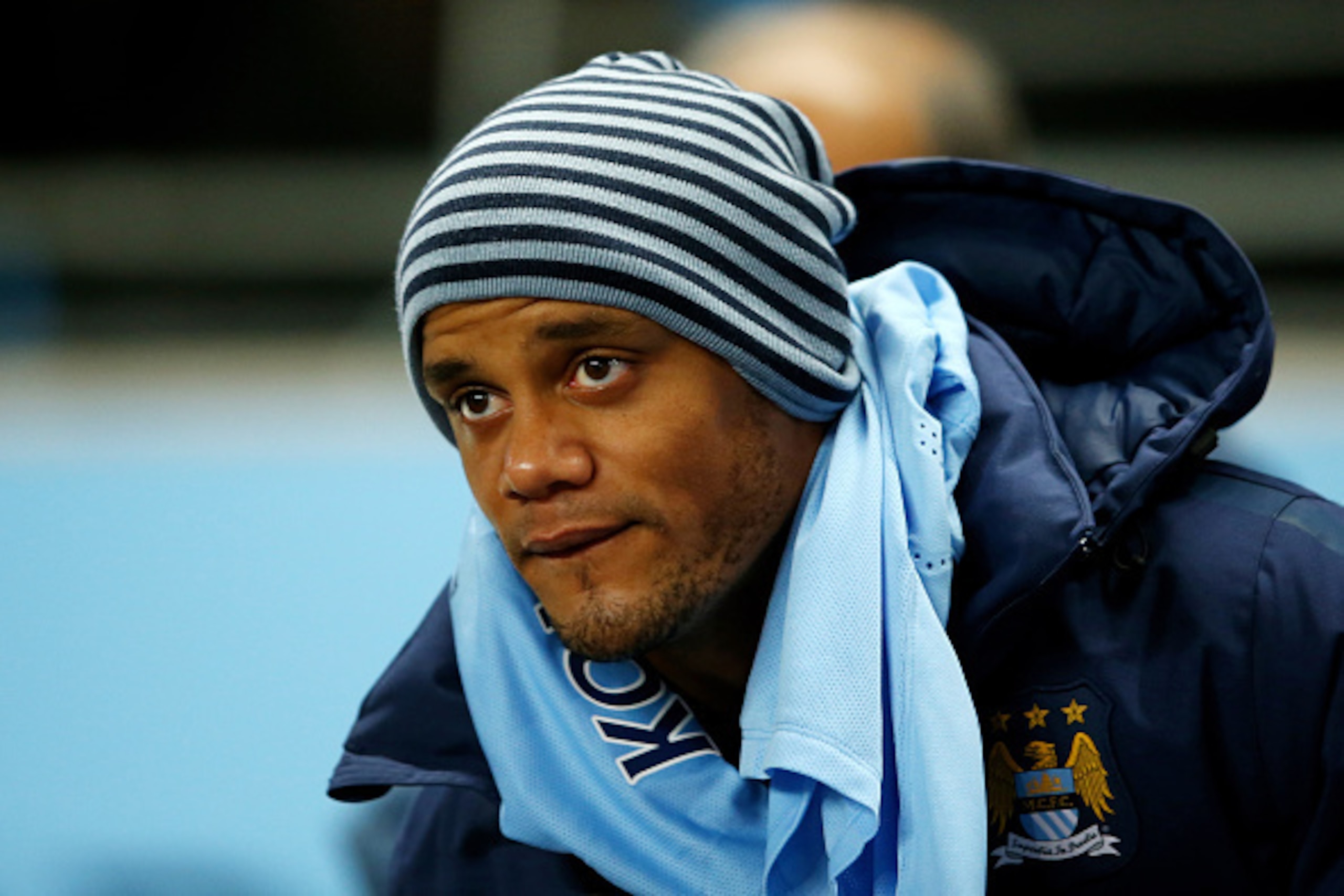 MANCHESTER, ENGLAND - MARCH 04:  Substitute Vincent Kompany of Manchester City looks on during the Barclays Premier League match between Manchester City and Leicester City at the Etihad Stadium on March 4, 2015 in Manchester, England.  (Photo by Richard H