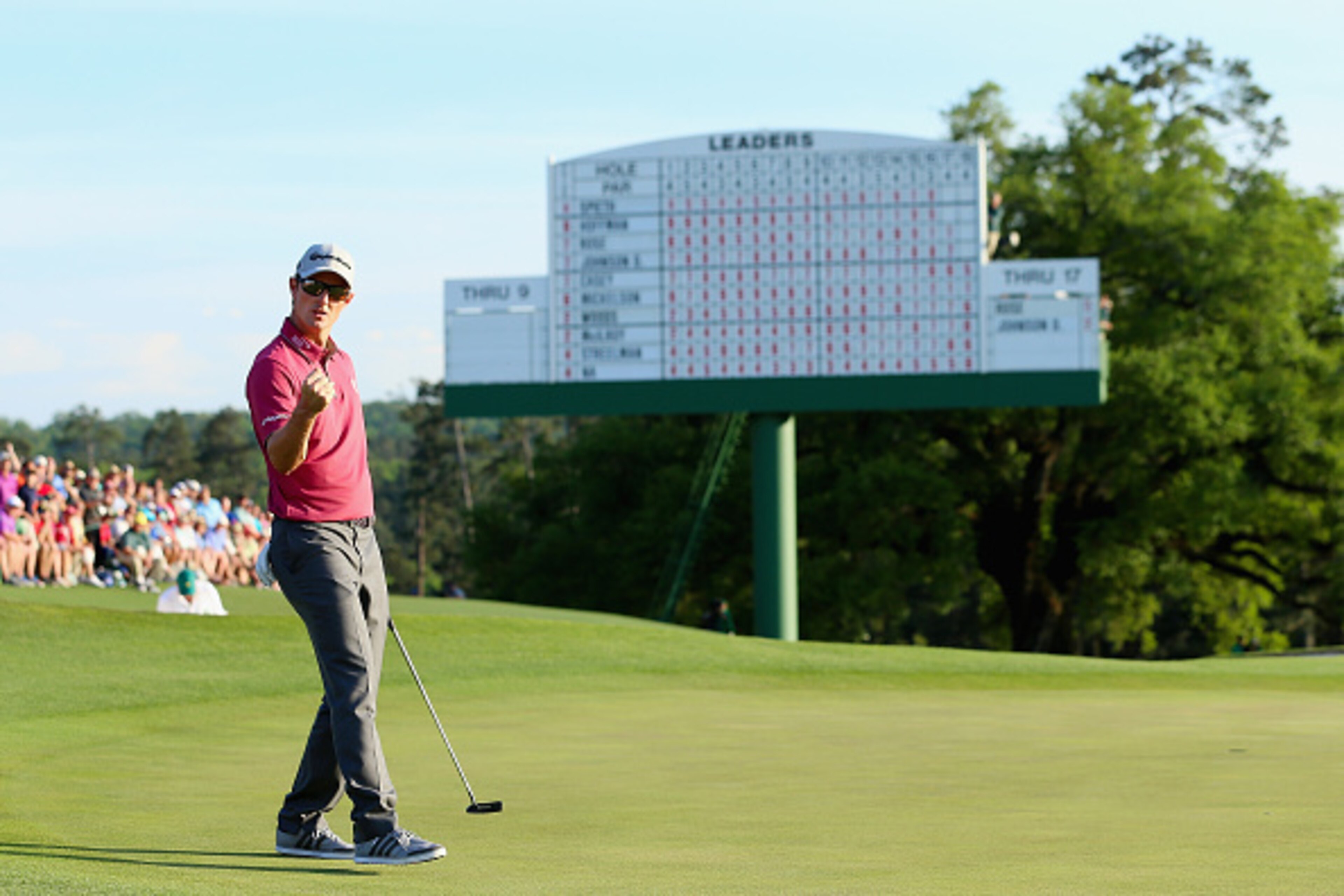 AUGUSTA, GA - APRIL 11:  Justin Rose of England celebrates after a birdie putt on the 18th green during the third round of the 2015 Masters Tournament at Augusta National Golf Club on April 11, 2015 in Augusta, Georgia.  (Photo by Andrew Redington/Getty I
