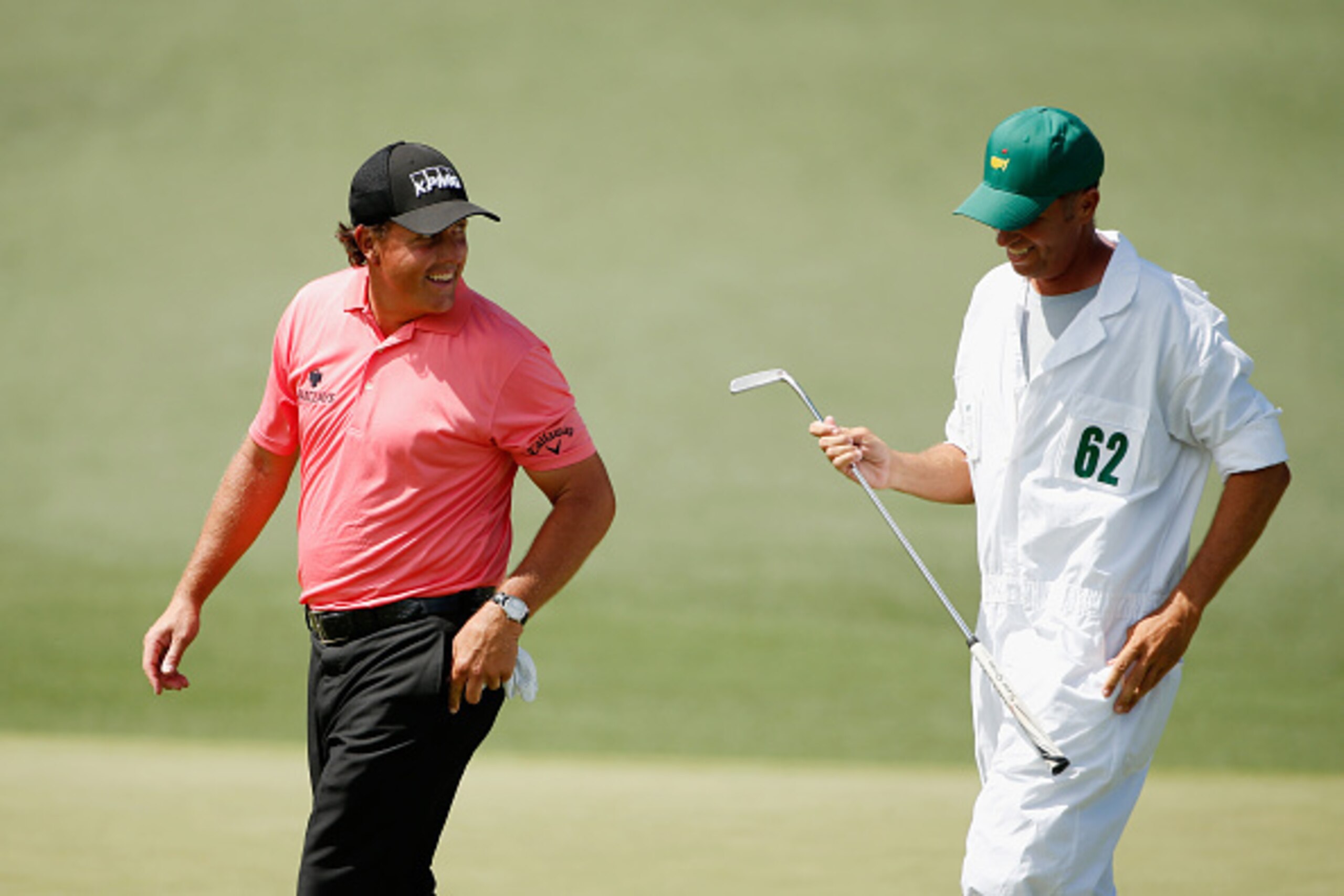 AUGUSTA, GA - APRIL 11:  Phil Mickelson of the United States and his caddie Jim Mackay walk across the second green during the third round of the 2015 Masters Tournament at Augusta National Golf Club on April 11, 2015 in Augusta, Georgia.  (Photo by Ezra 