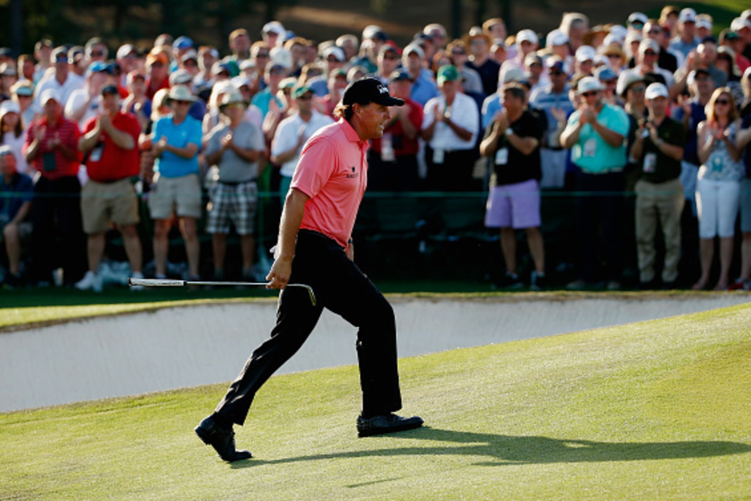 AUGUSTA, GA - APRIL 11:  Phil Mickelson of the United States walks to the 18th green during the third round of the 2015 Masters Tournament at Augusta National Golf Club on April 11, 2015 in Augusta, Georgia.  (Photo by Ezra Shaw/Getty Images)