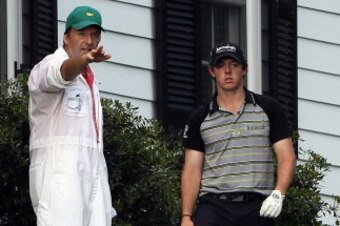 AUGUSTA, GA - APRIL 10:  Rory McIlroy of Northern Ireland waits to plays a shot on the tenth hole as his caddie J.P. Fitzgerald looks on during the final round of the 2011 Masters Tournament at Augusta National Golf Club on April 10, 2011 in Augusta, Geor